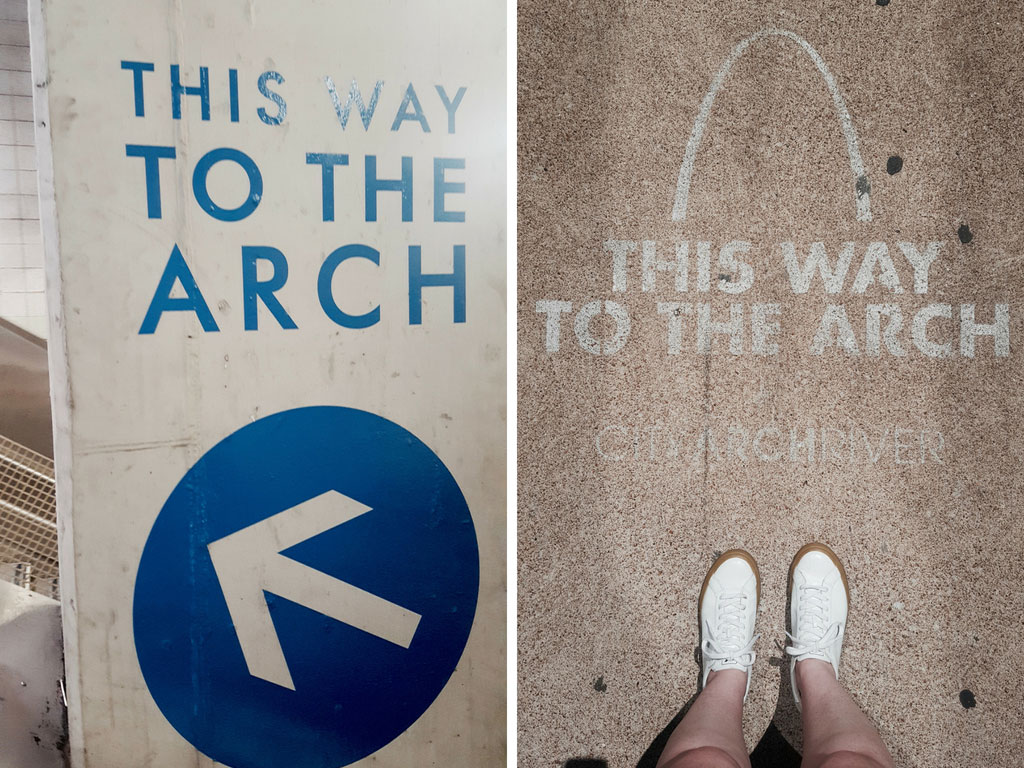 Signs in St. Louis read "This way to the Arch"