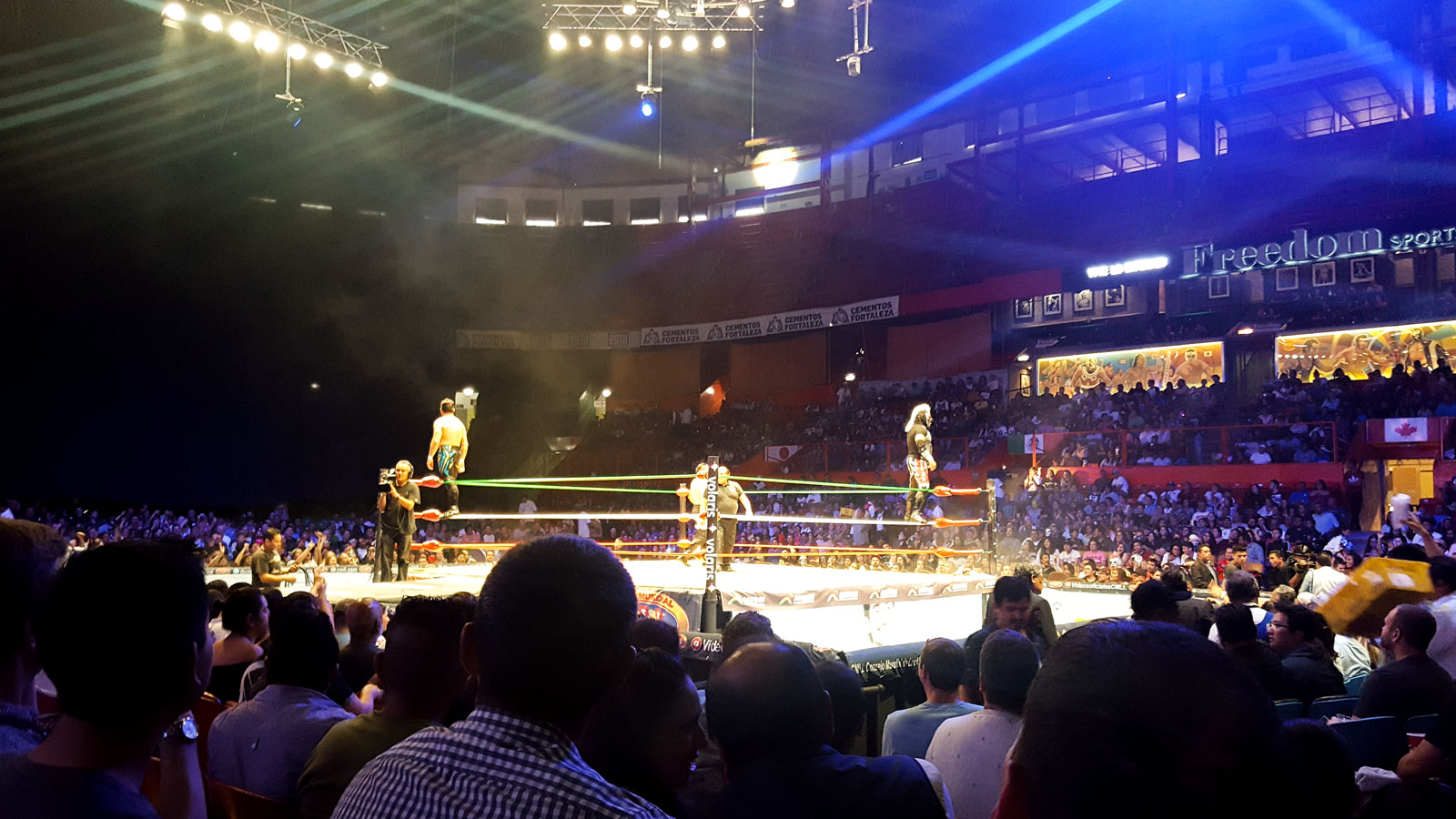 Wrestlers in the ring at a Lucha Libre match in Mexico City