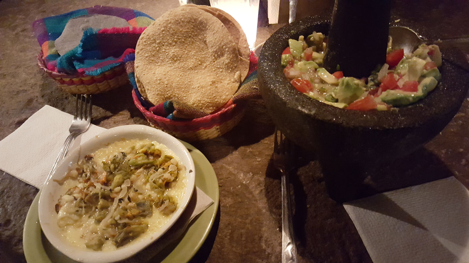 Late night dishes of Queso Fundido y Guacamole