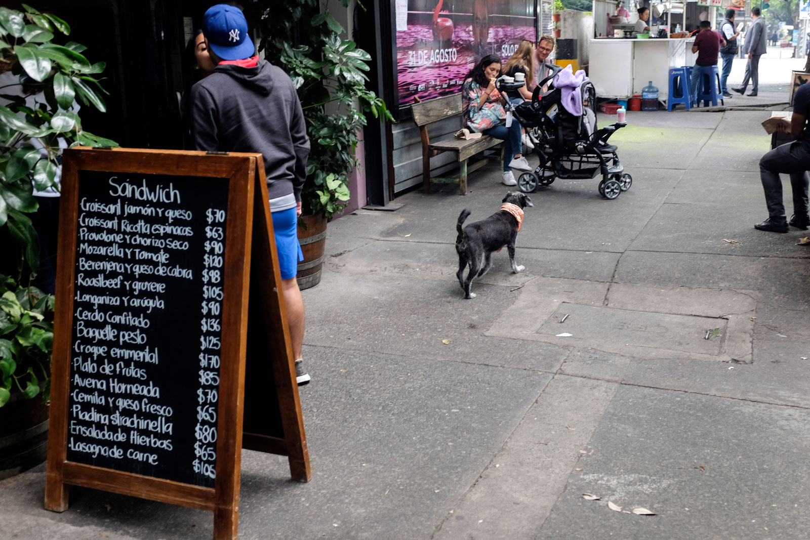 A crowd gathers outside Panaderia Rosetta