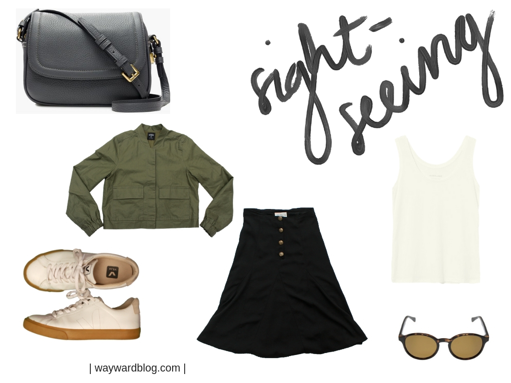 Sightseeing Outfit for Mexico City: a white tank, black skirt, green jacket, white sneakers, and black purse