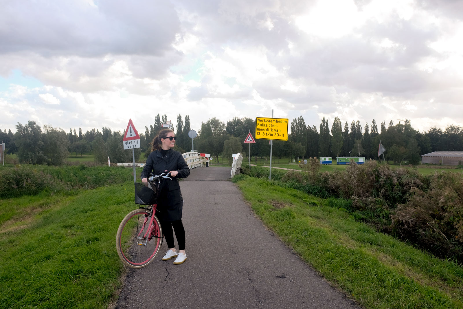 Alyssa with a bike in Amsterdam Noord