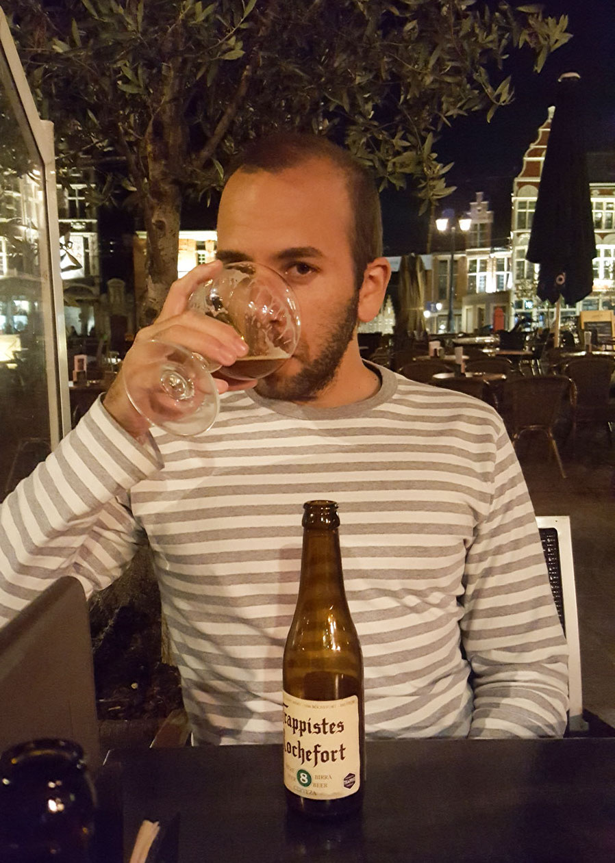 Michael drinks a Belgian beer at a pub in Ghent