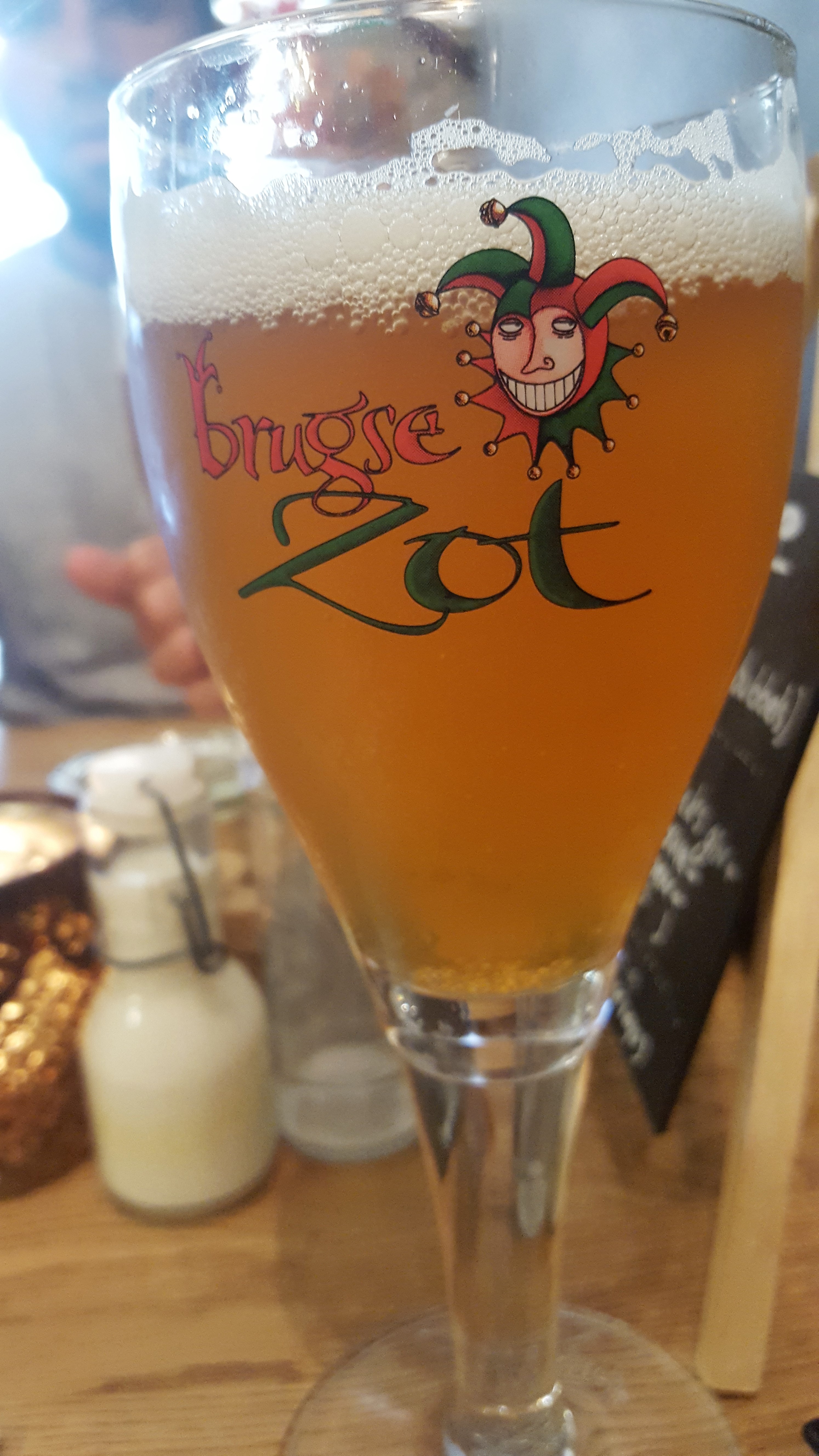 A beer glass that reads Brugse Zot