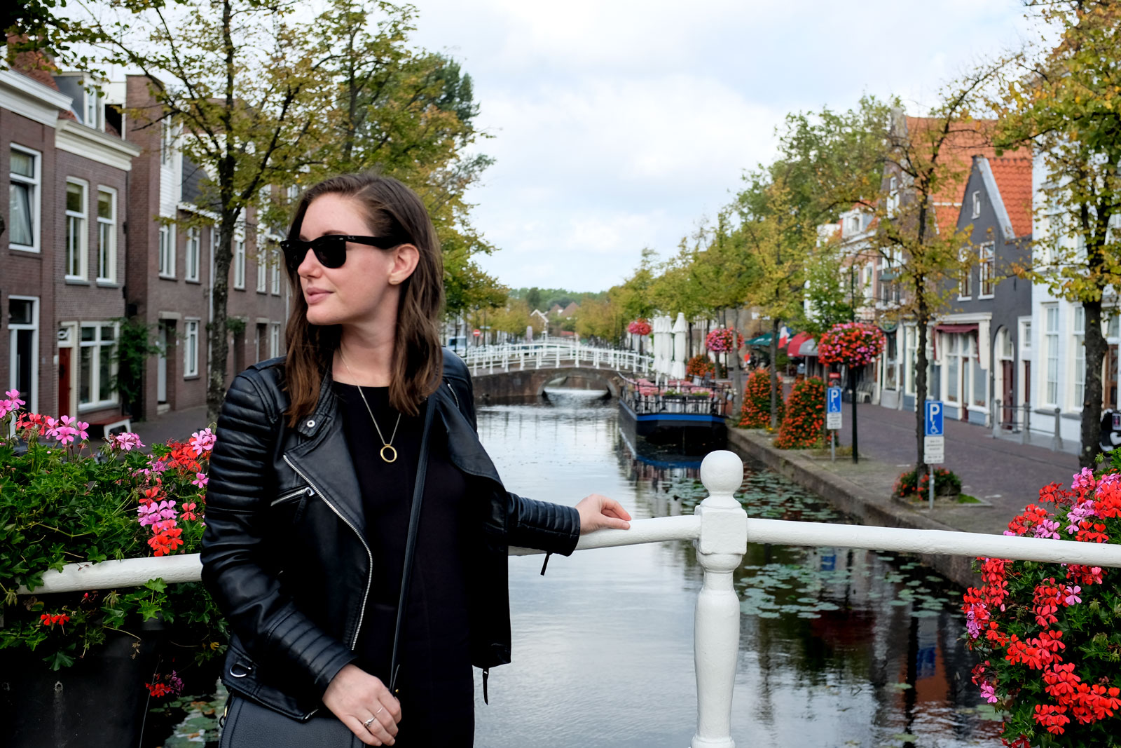 Alyssa poses alongside a canal in Delft