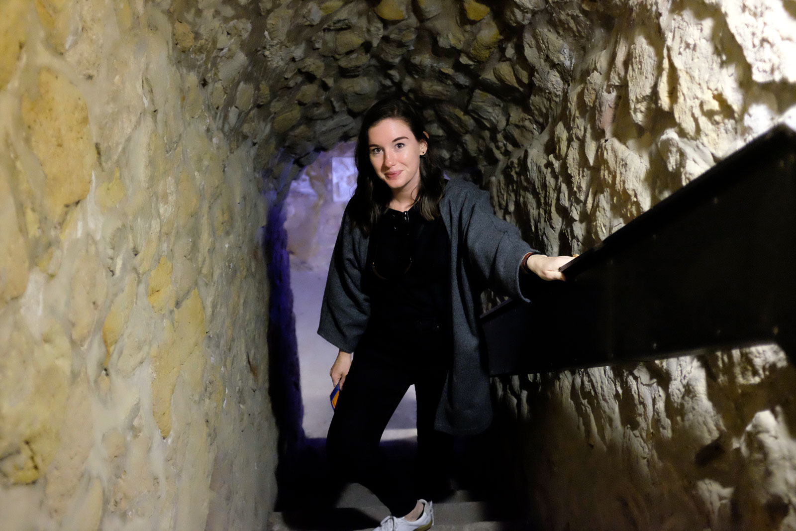Alyssa on the stairs at the Casemates du Bock in Luxembourg City