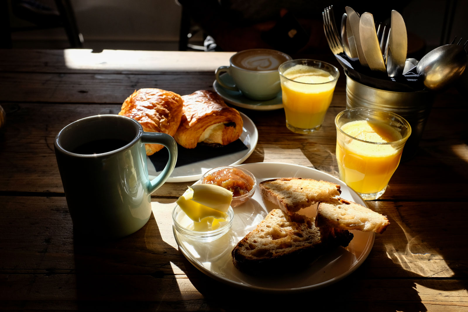 Two plates of breakfast dishes at Bloom Coffee in Luxembourg City