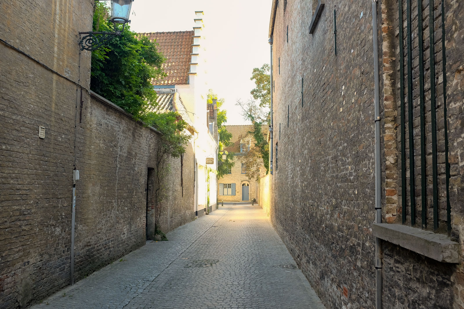 A view down a cobblestone alley in Bruges