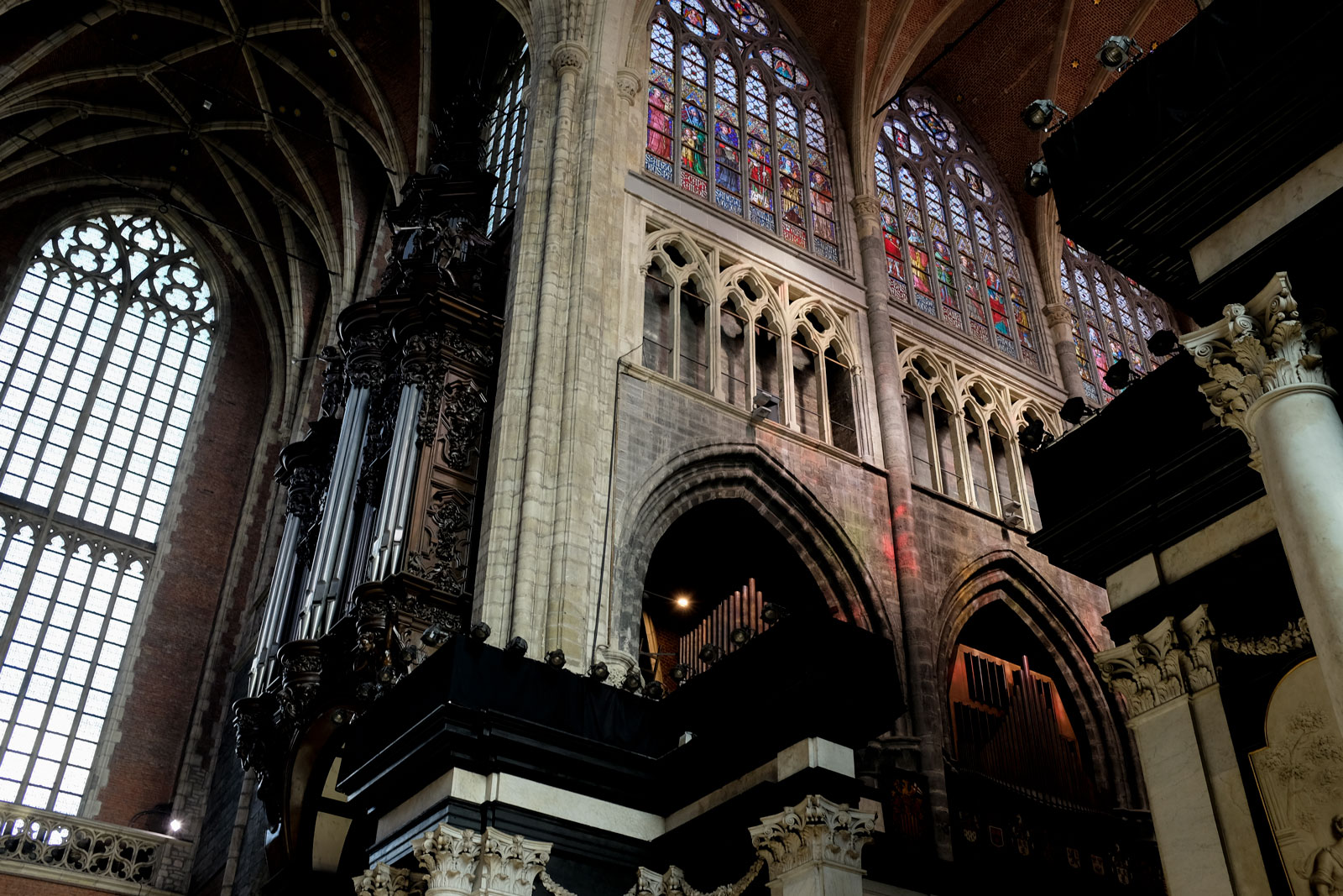 Stained glass and ornate decor at St. Bavo's Cathedral