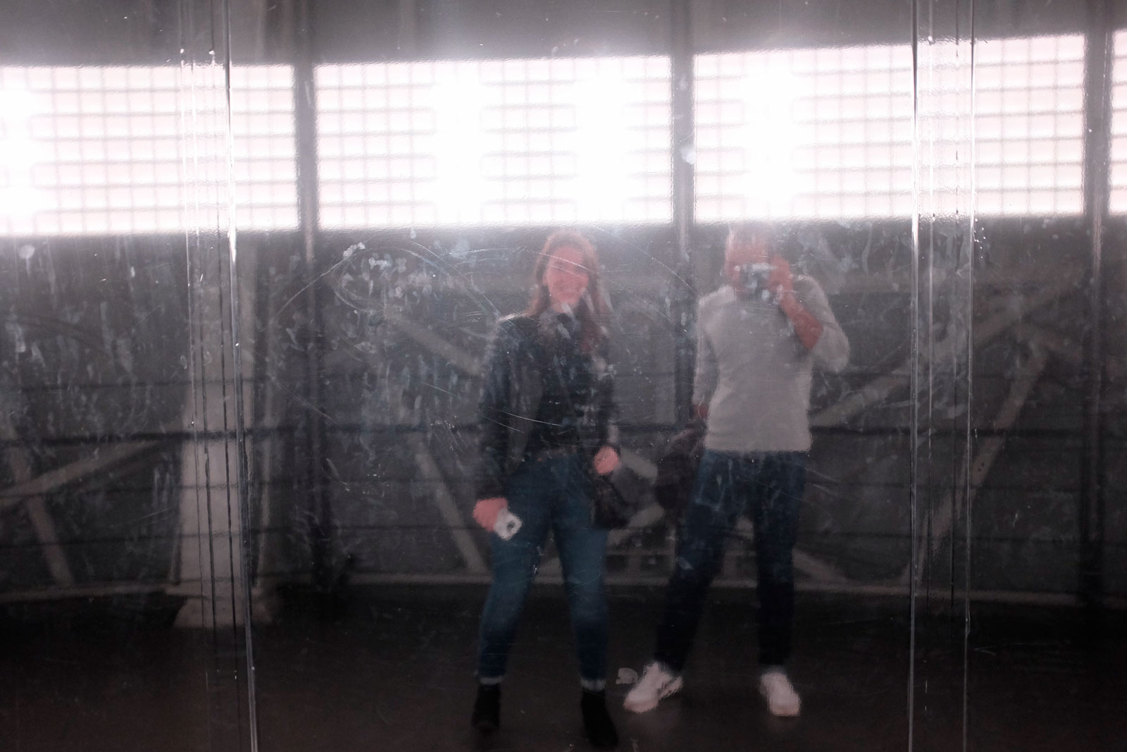 Alyssa and Michael in a reflection at the Atomium