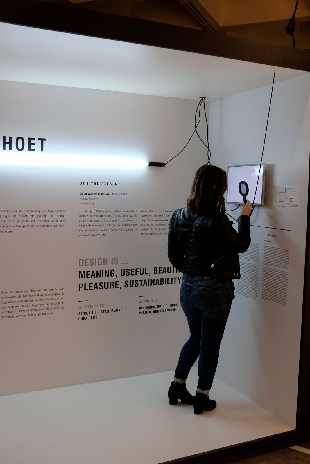 Alyssa interacts with an exhibit at the Design Museum in Brussels