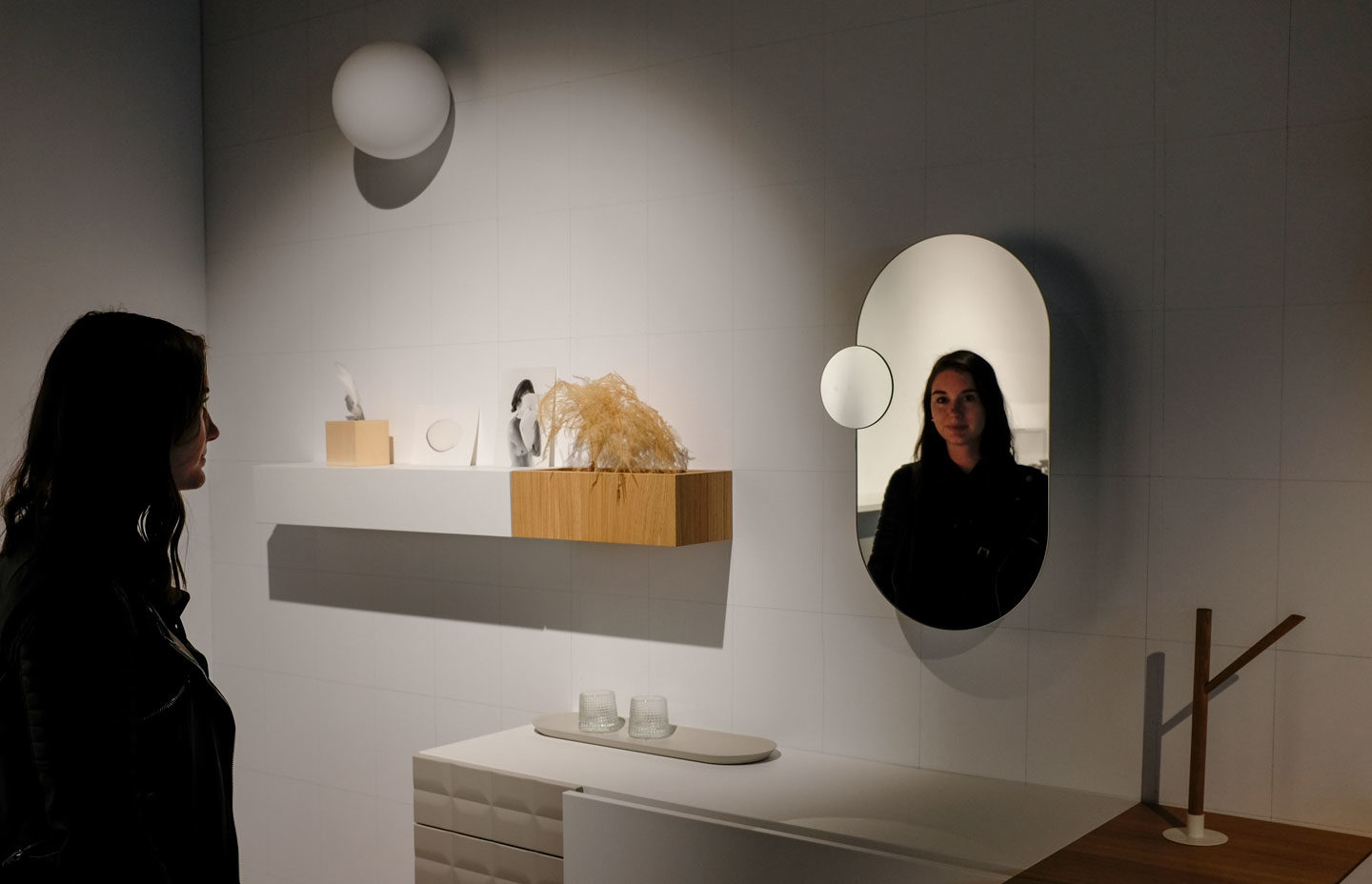 Alyssa is seen through a mirror at ADAM Brussels