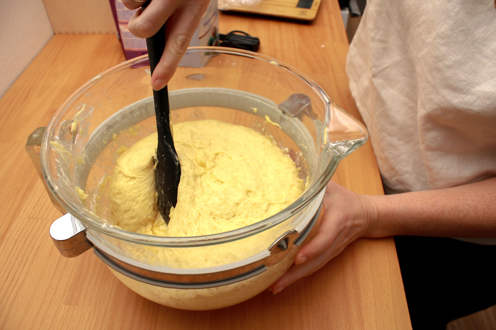 Alyssa deflates the waffle dough