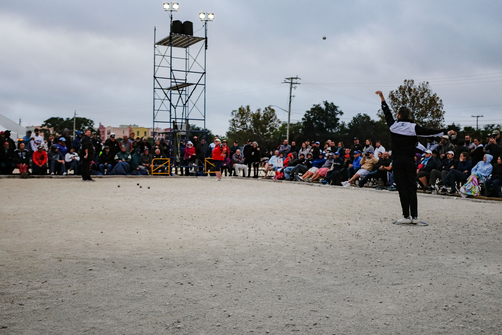 A team throwing petanque ball at amelia island