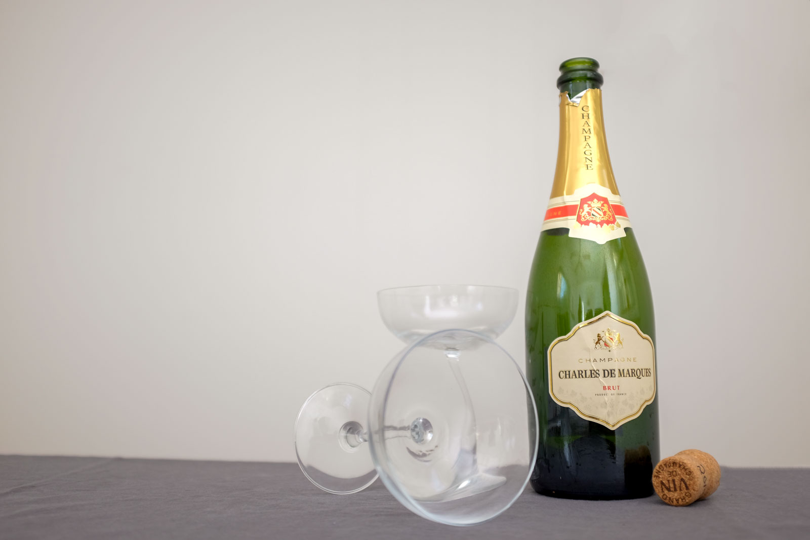 Empty Champagne Bottle and Glasses