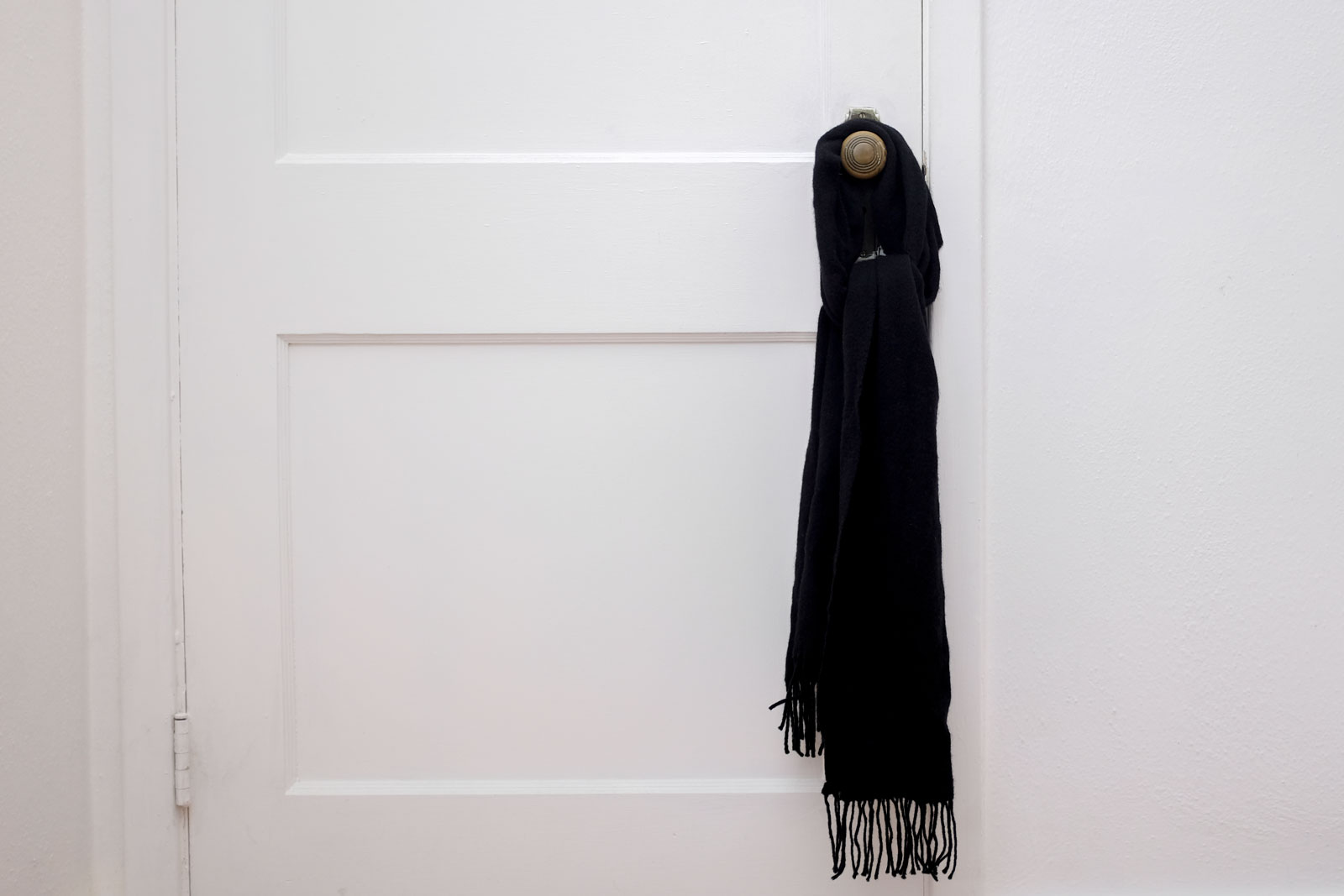 YSL Scarf hanging on door handle