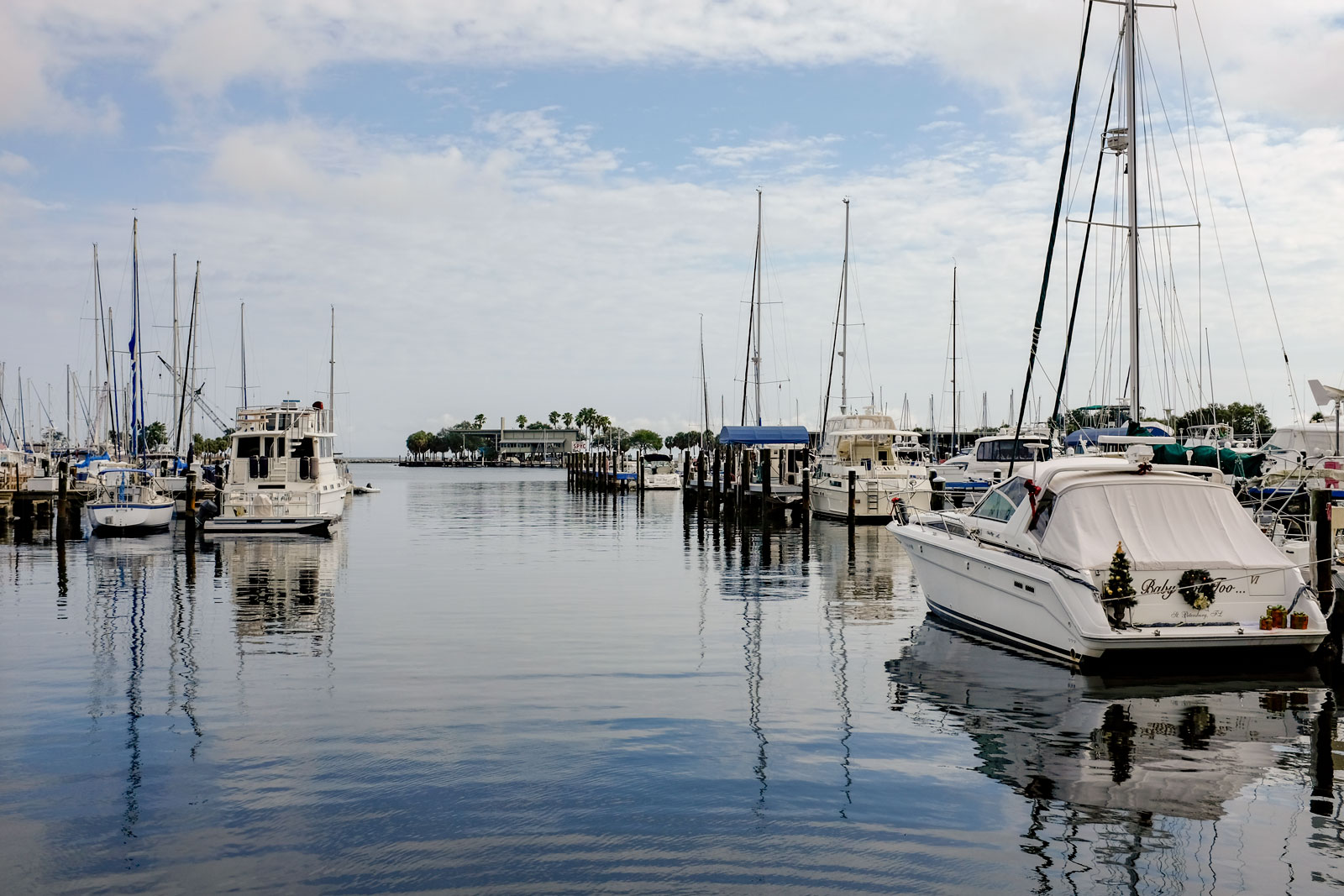 Boats bob along in a marina in St. Petersburg, FL