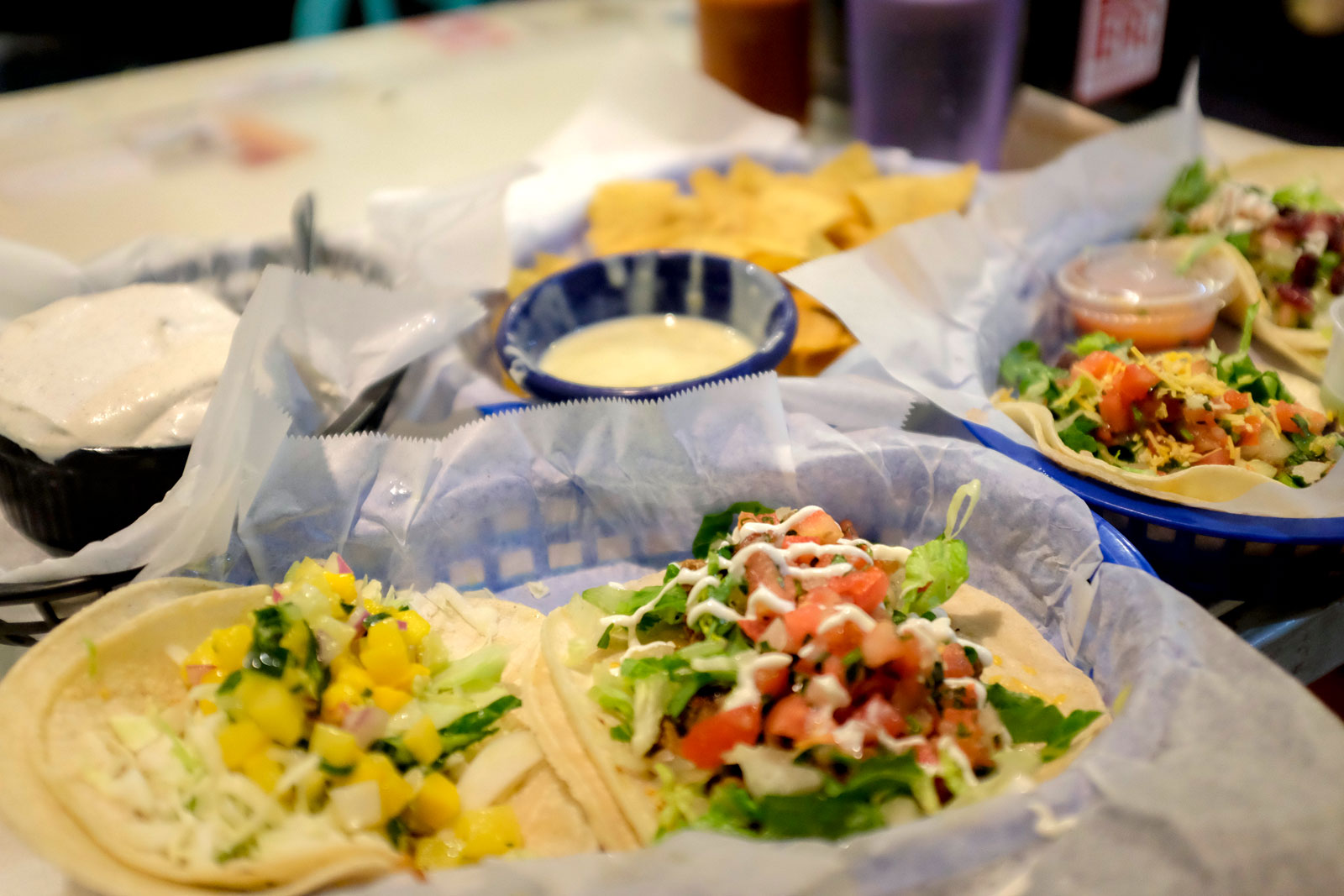 A table of tacos at White Duck Tacos