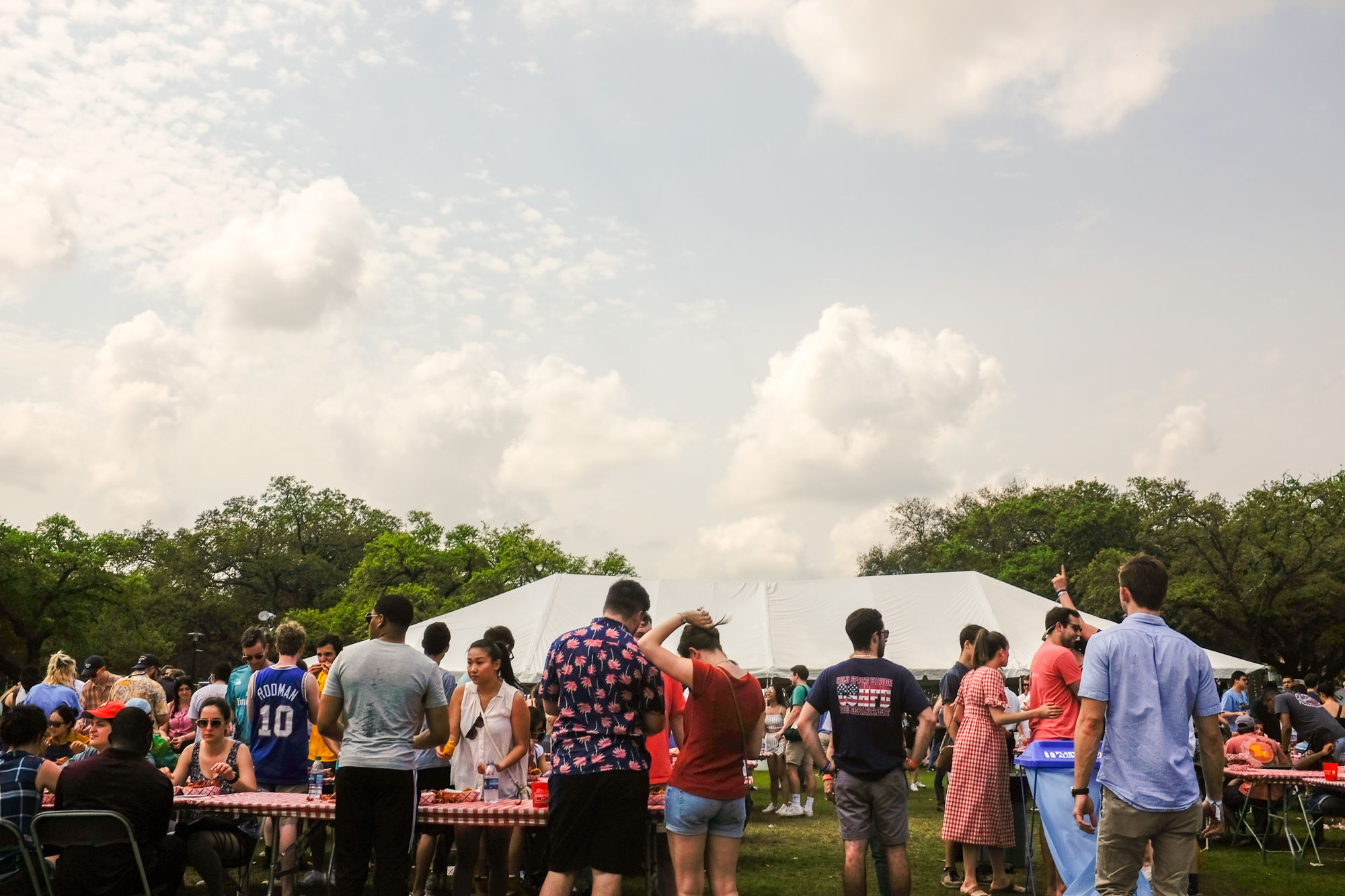 crowd of people eating crawfish