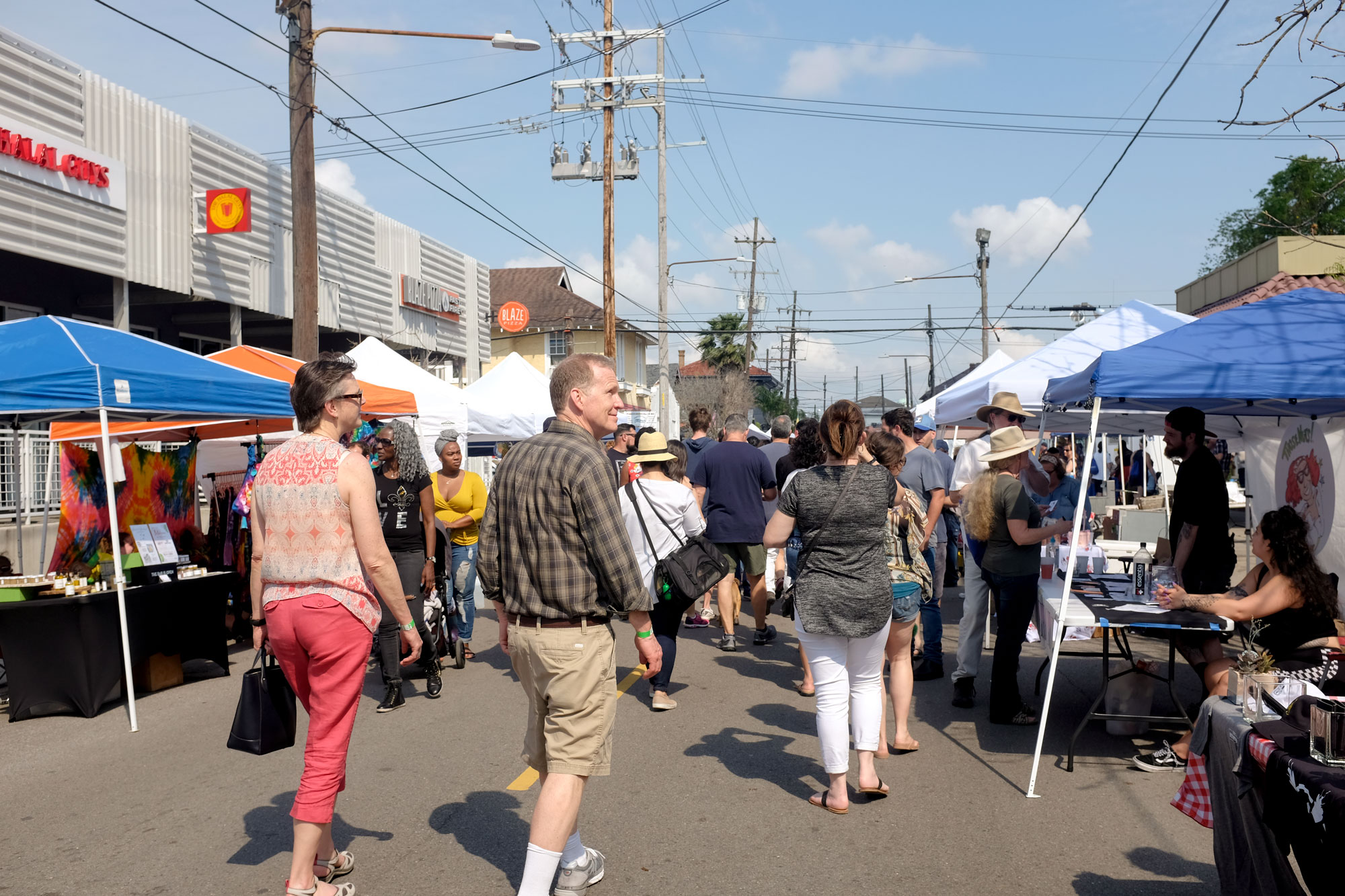 Crowd of people on Freret Street in New Orleans