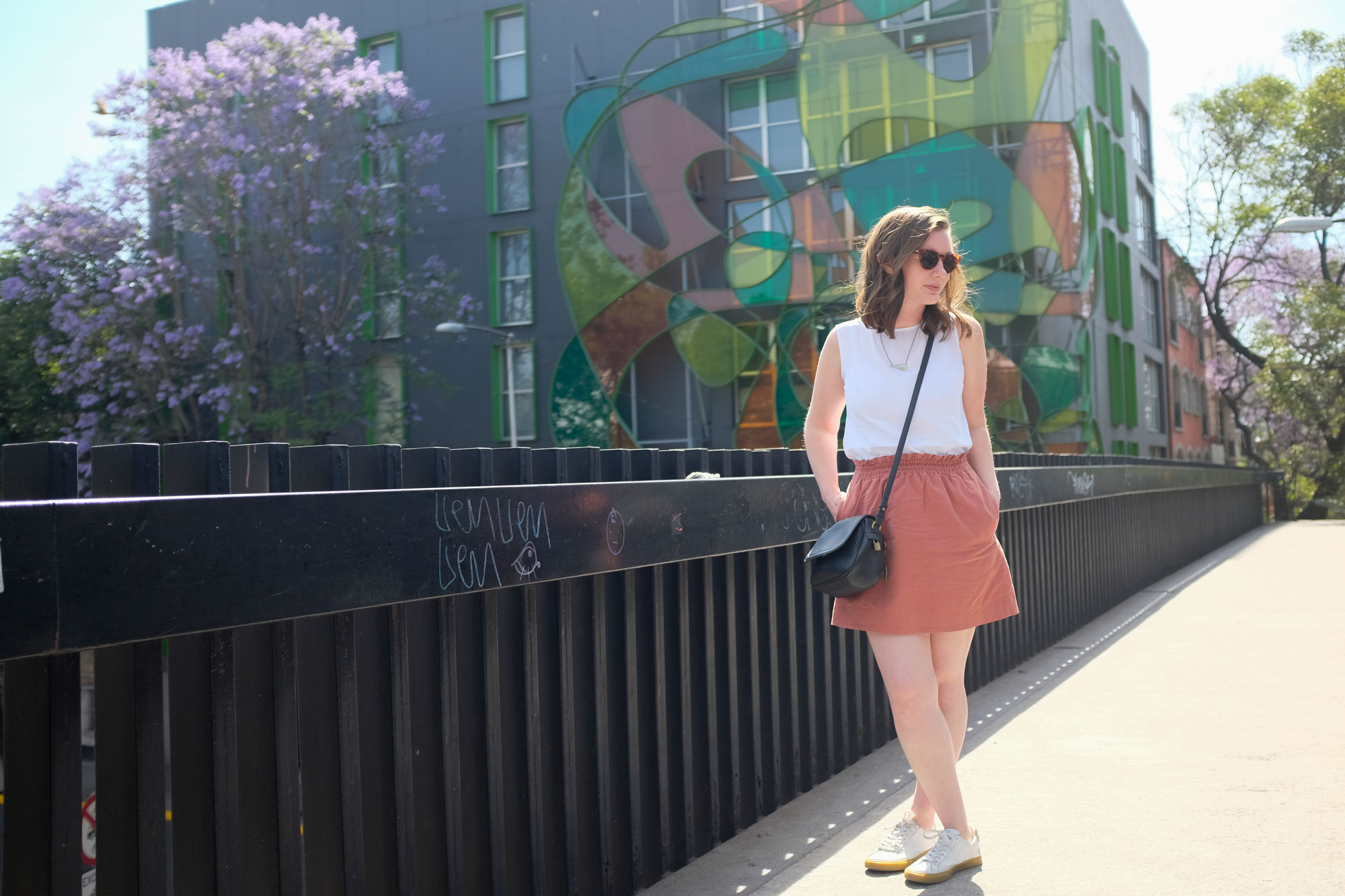 Krystal standing on an overpass in mexico city