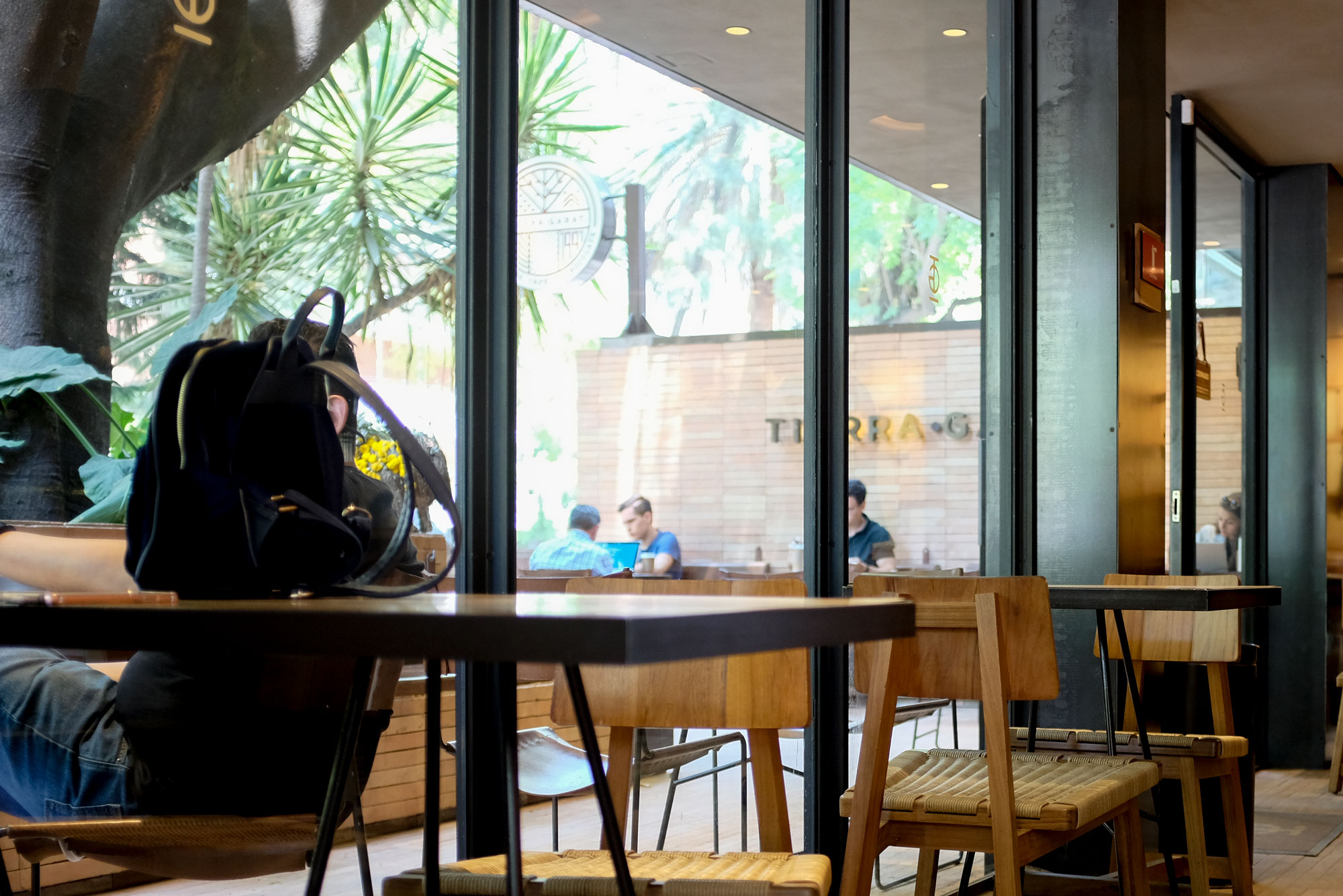 View of diners through the window at Tierra Garat