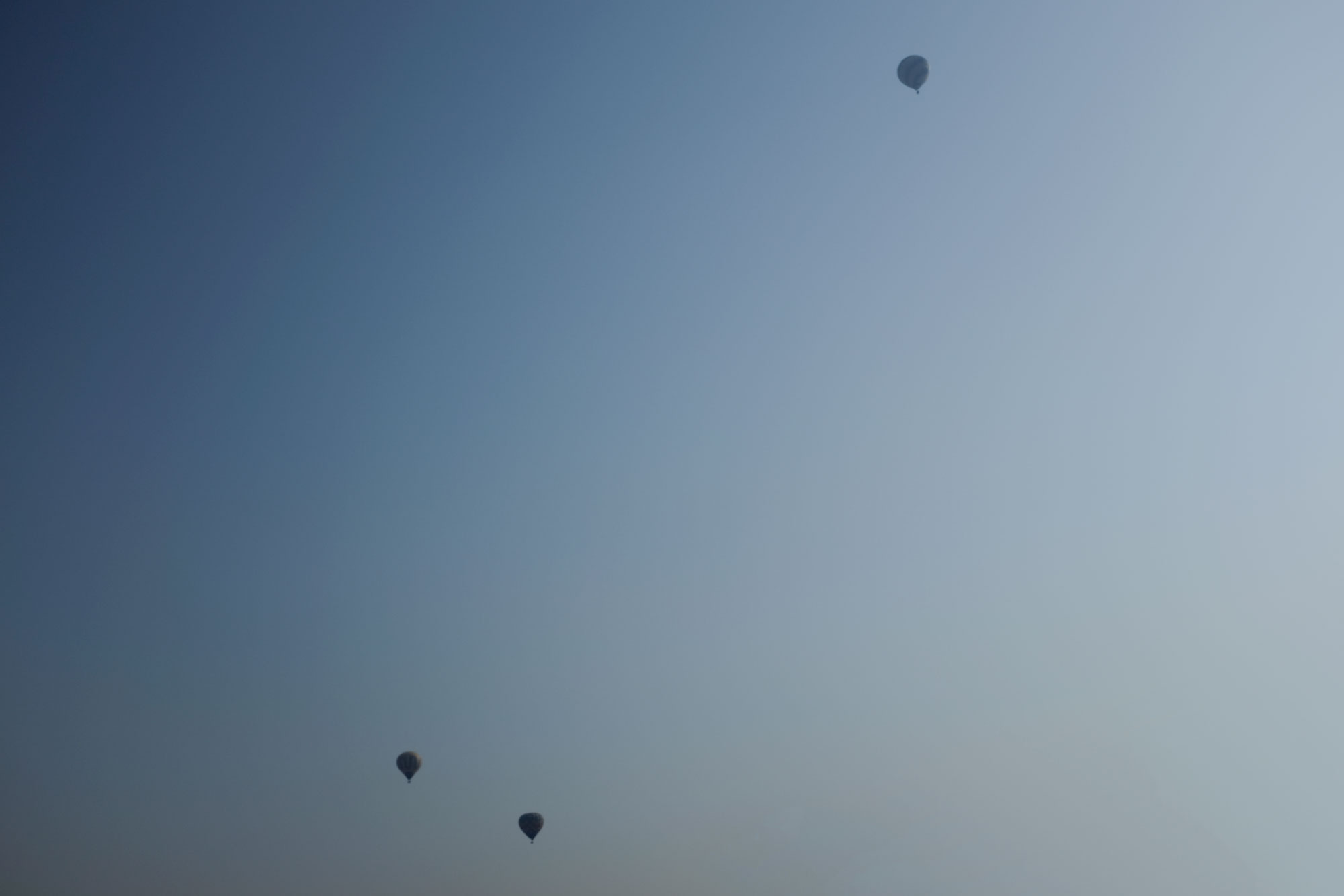 Three hot air balloons in the sky