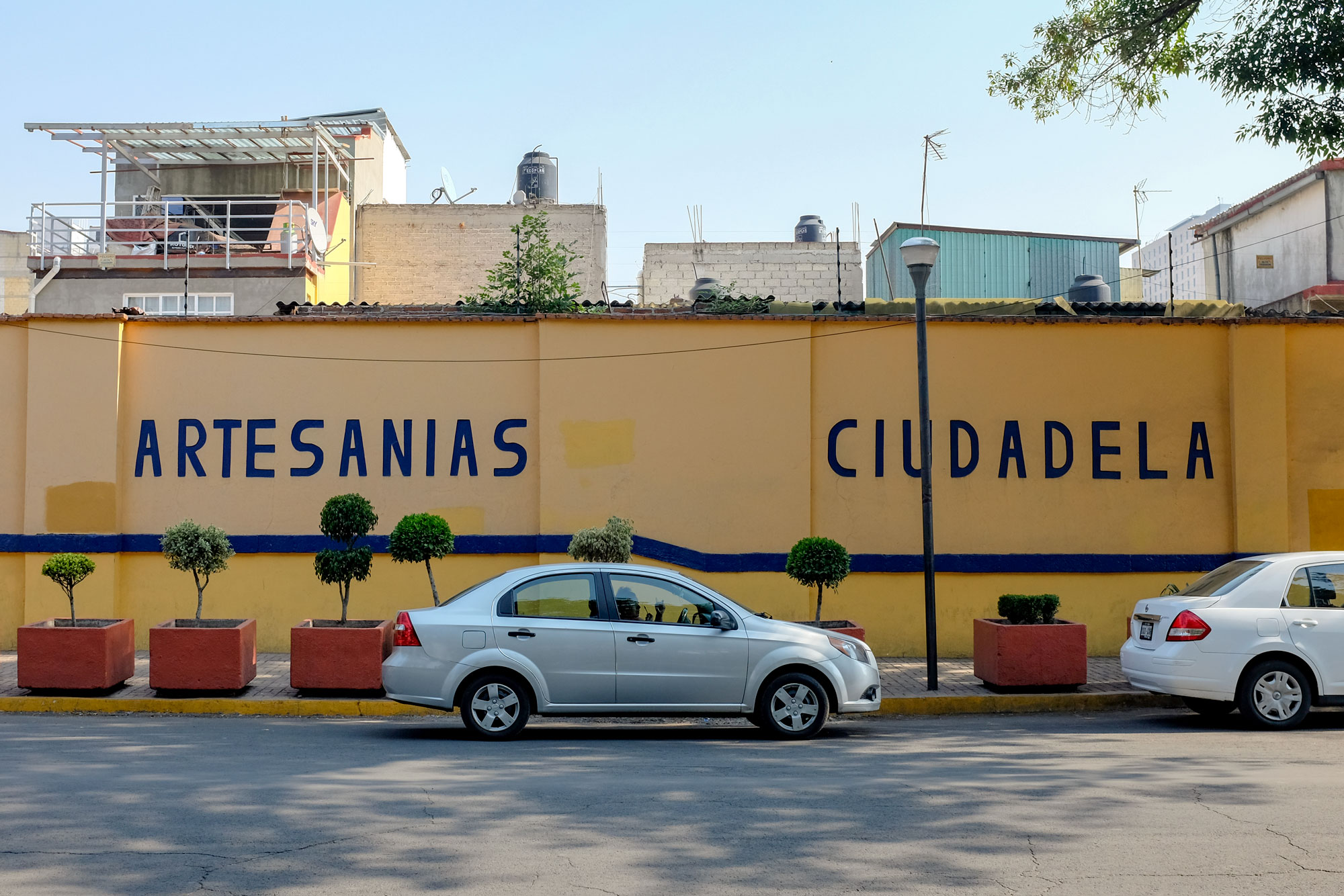 Exterior of the artisan market and it says Artesanias Ciudadela on the outside