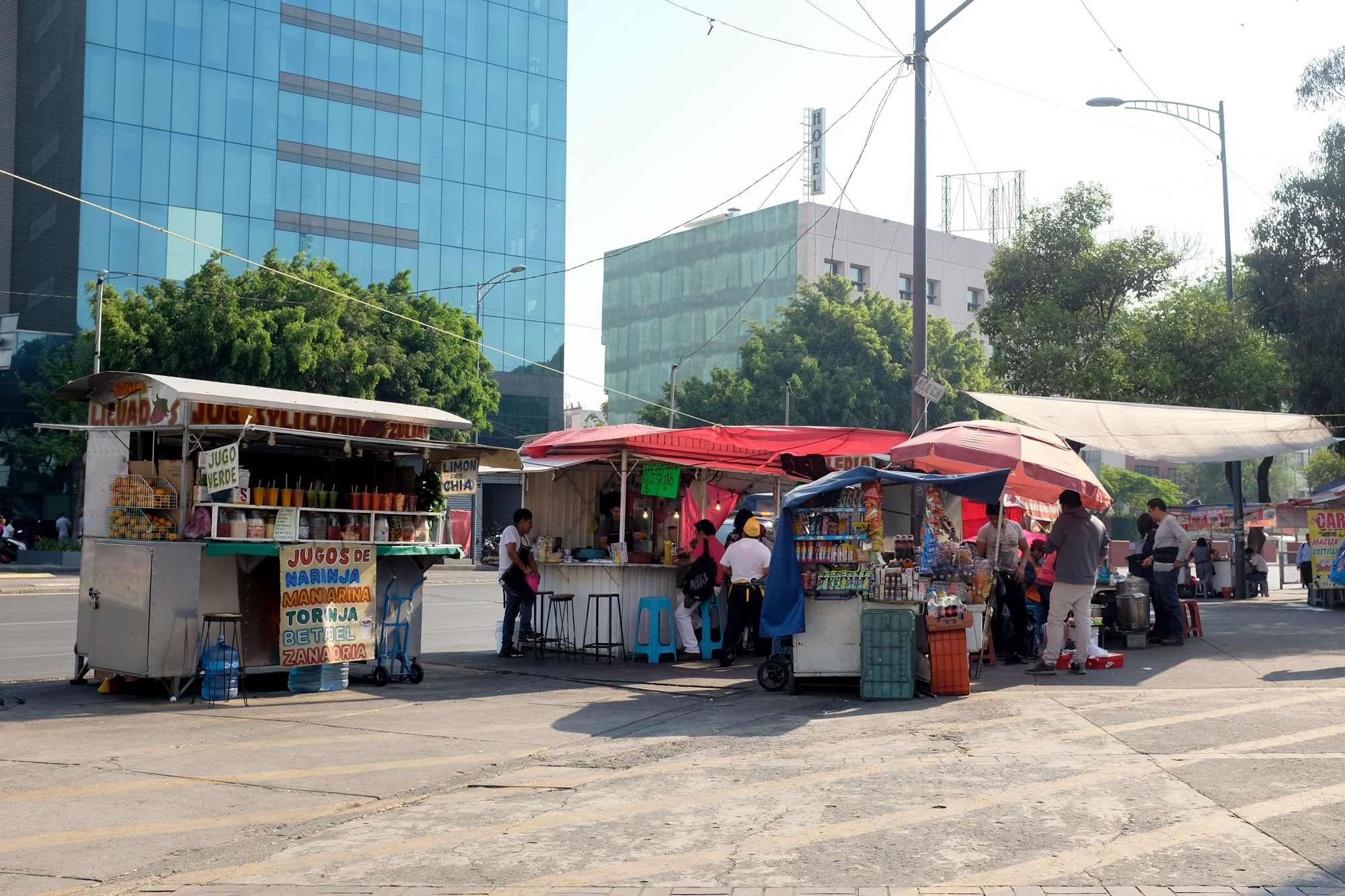 Street vendors and their stalls of juice and other foods