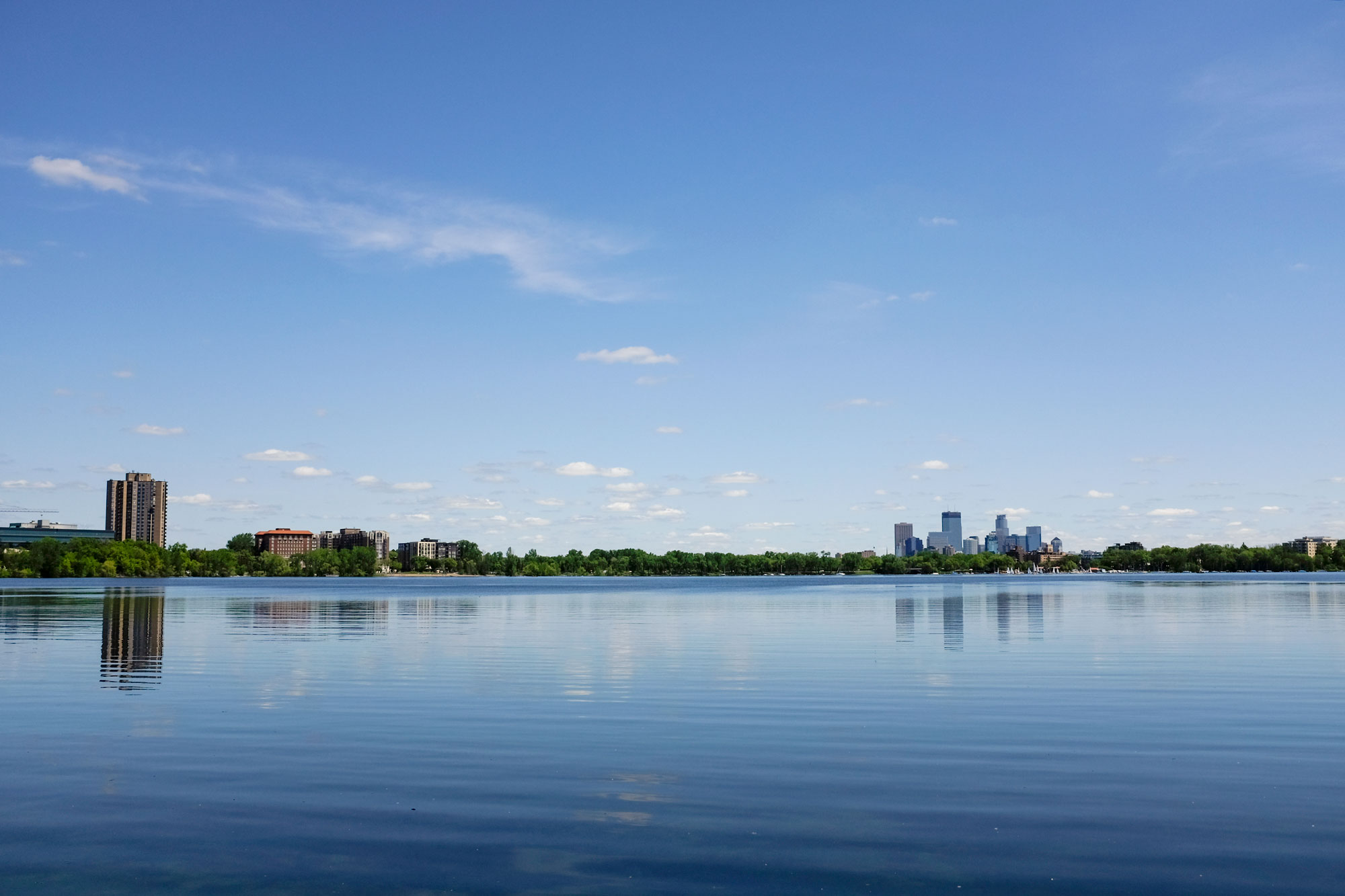 view of downtown minneapolis from a lake