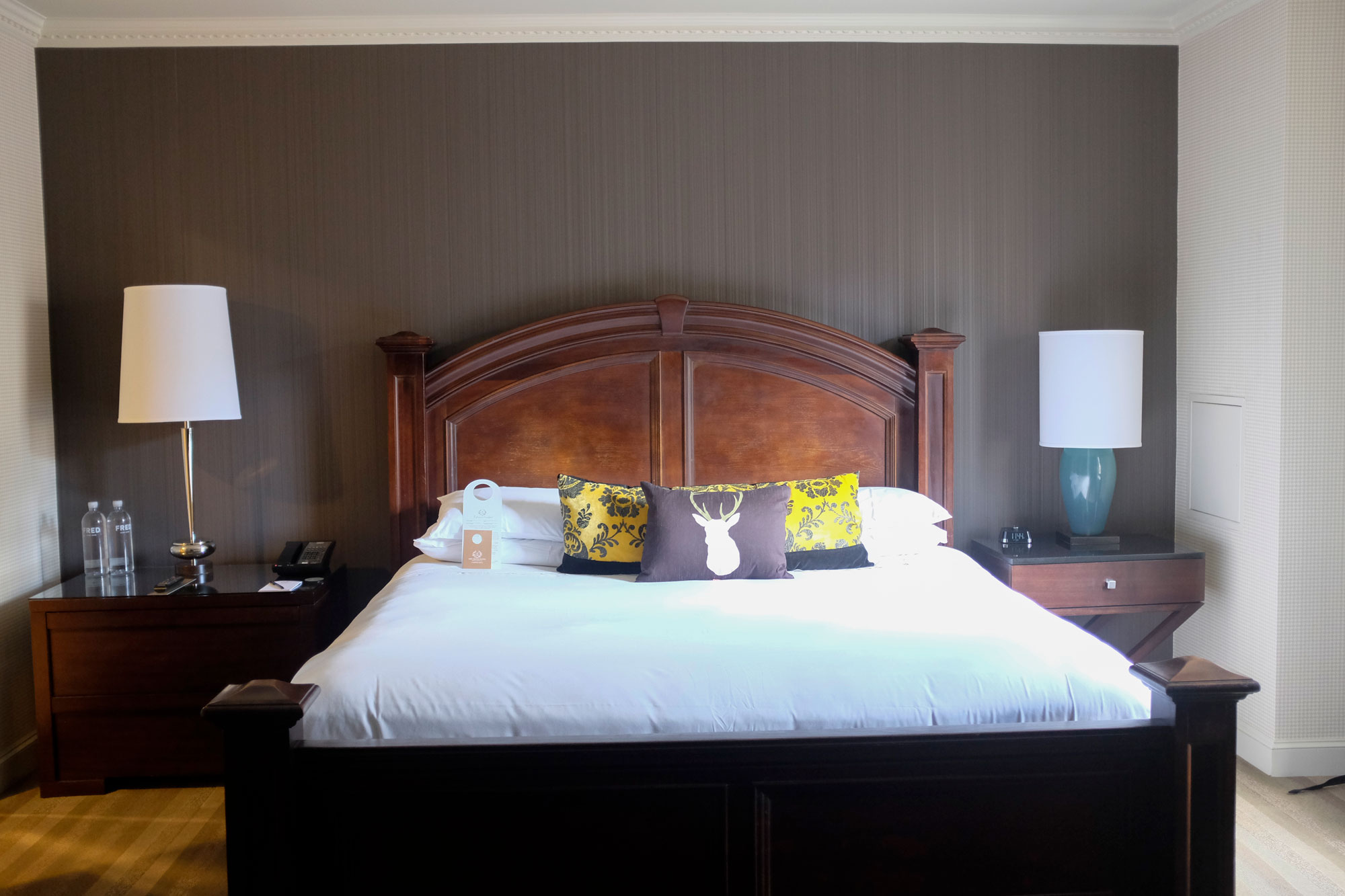 photo of bed in grand hotel room