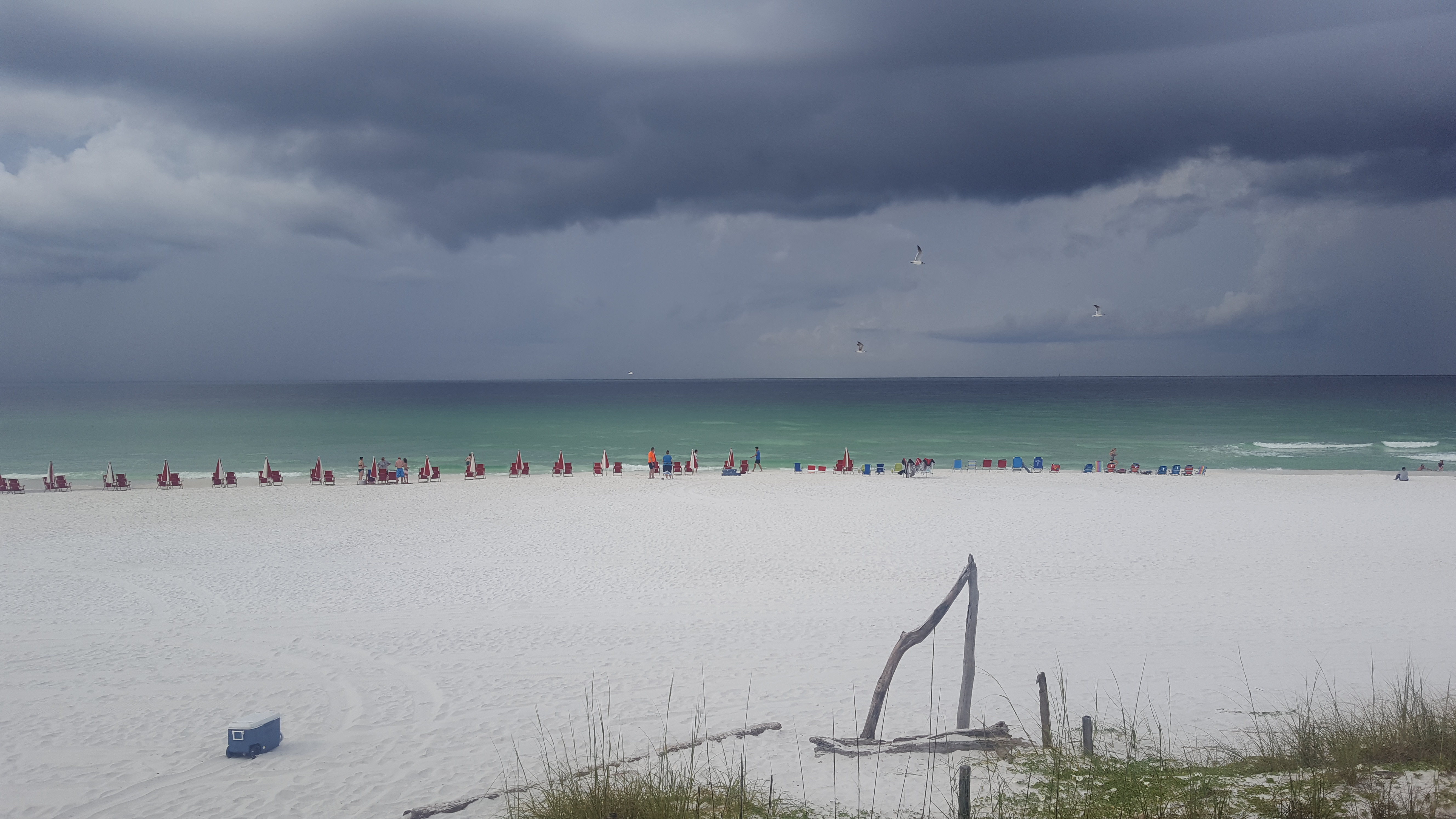 Beach in Destin with a storm in the background