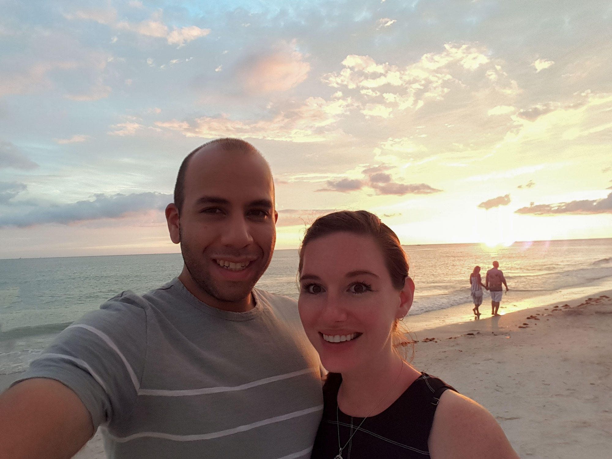 krystal and michael in front of the sunset