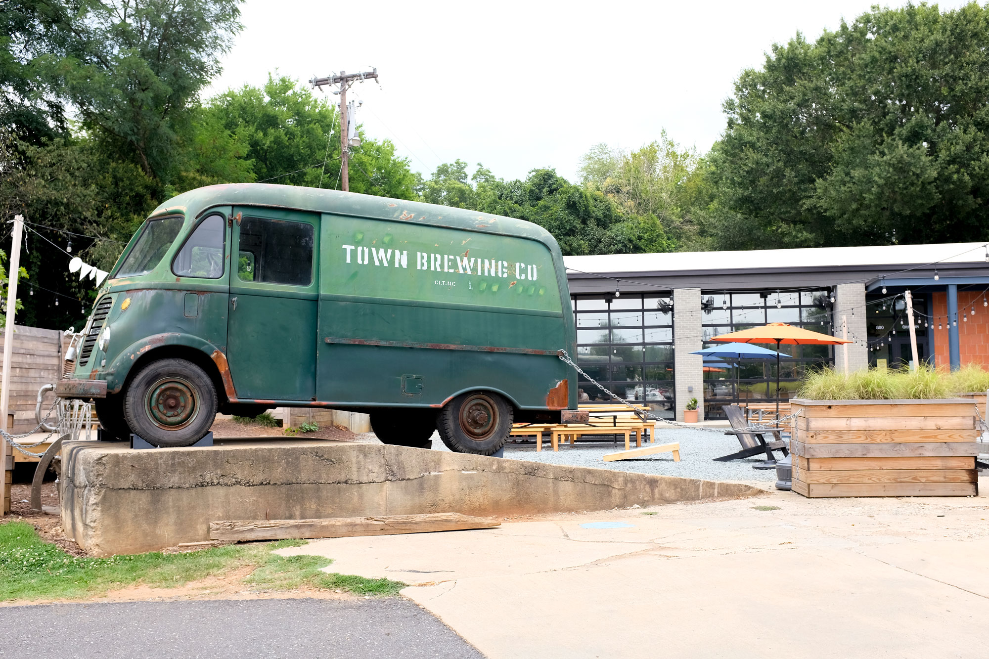 Van outside of Town Brewing with their logo printed on