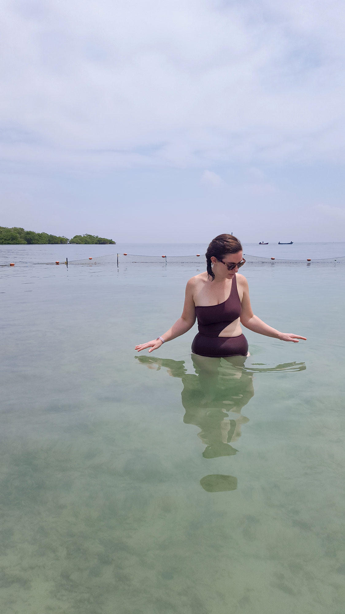 Krystal standing in the water at Islabela