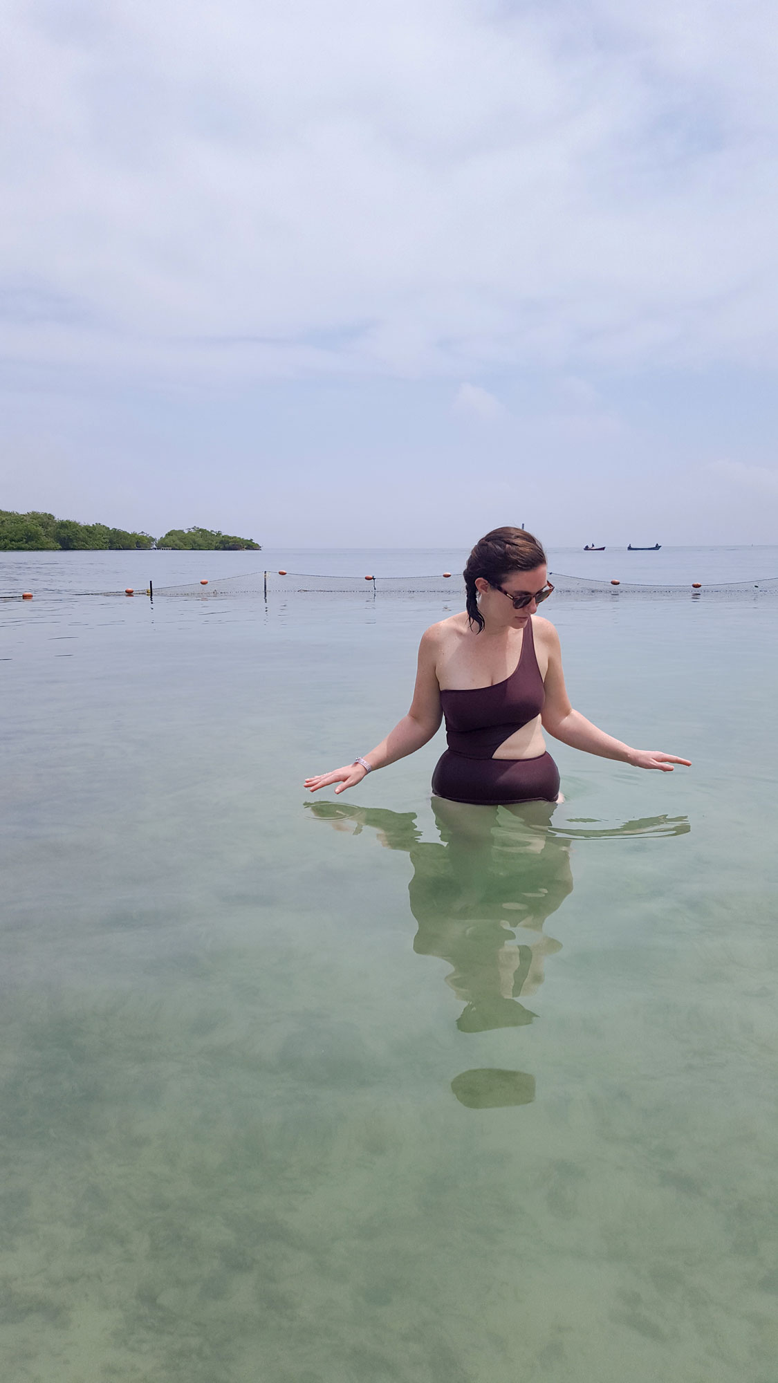 Alyssa standing in the water at Islabela