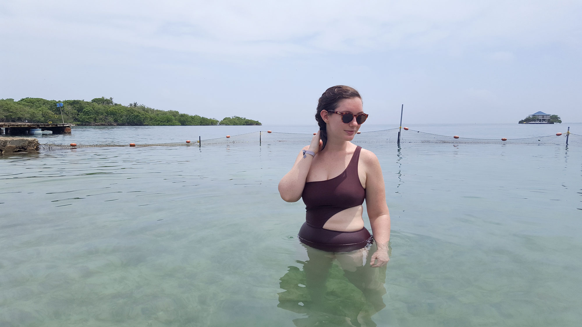 Krystal standing in the Caribbean