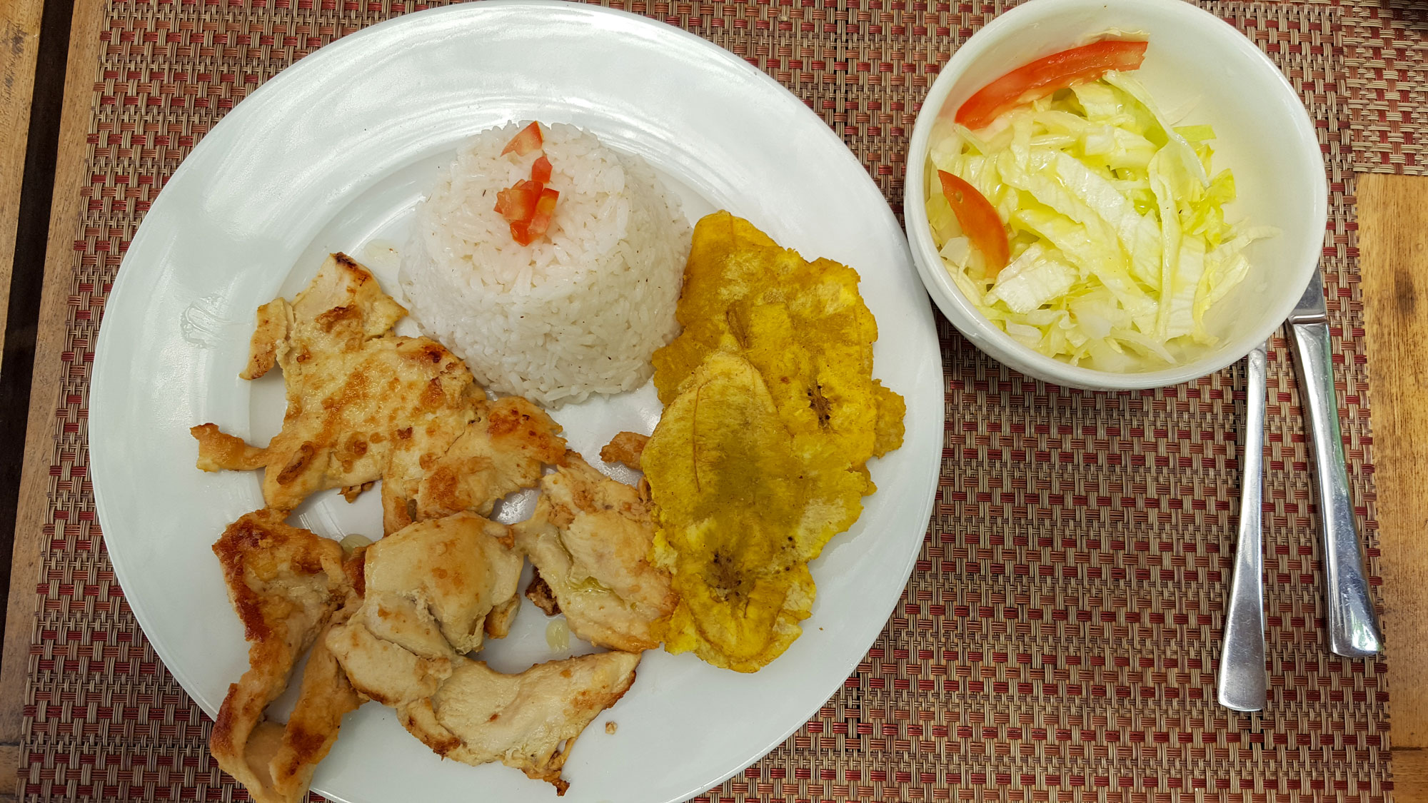 Michael's meal: salad, chicken, plantains, rice