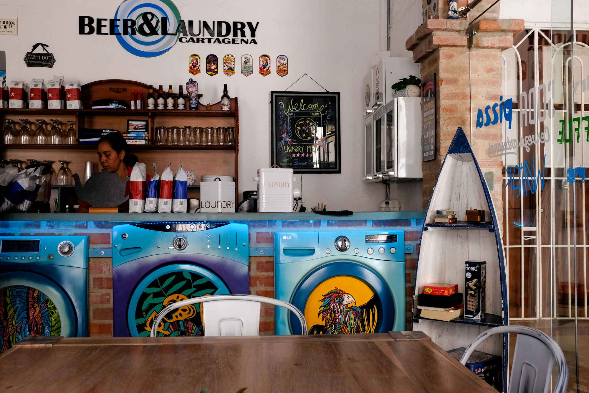 Interior of beer and laundry. The bar is made to look like washing machines!