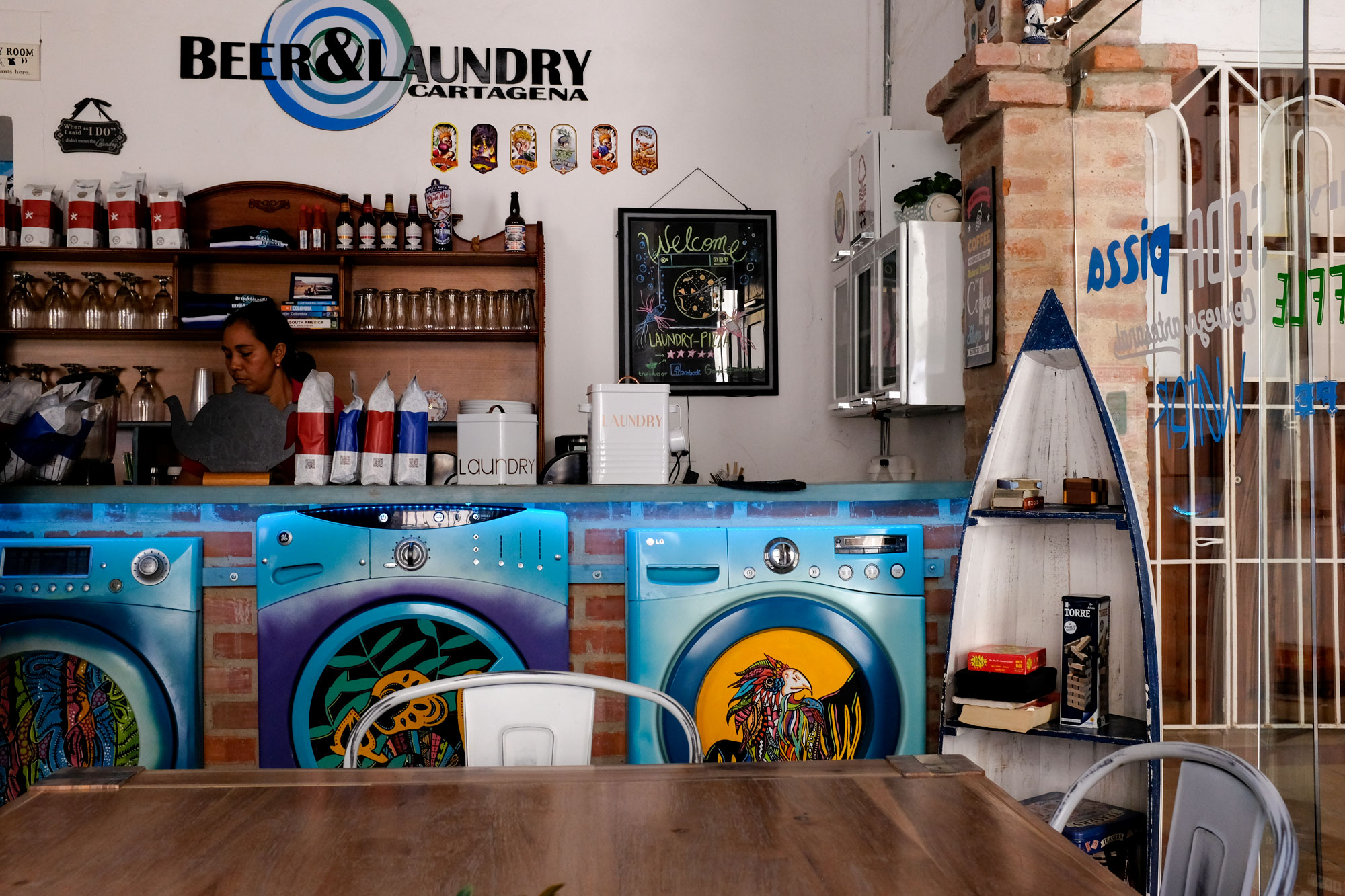 Interior of beer and laundry. The bar is made to look like washing machines!