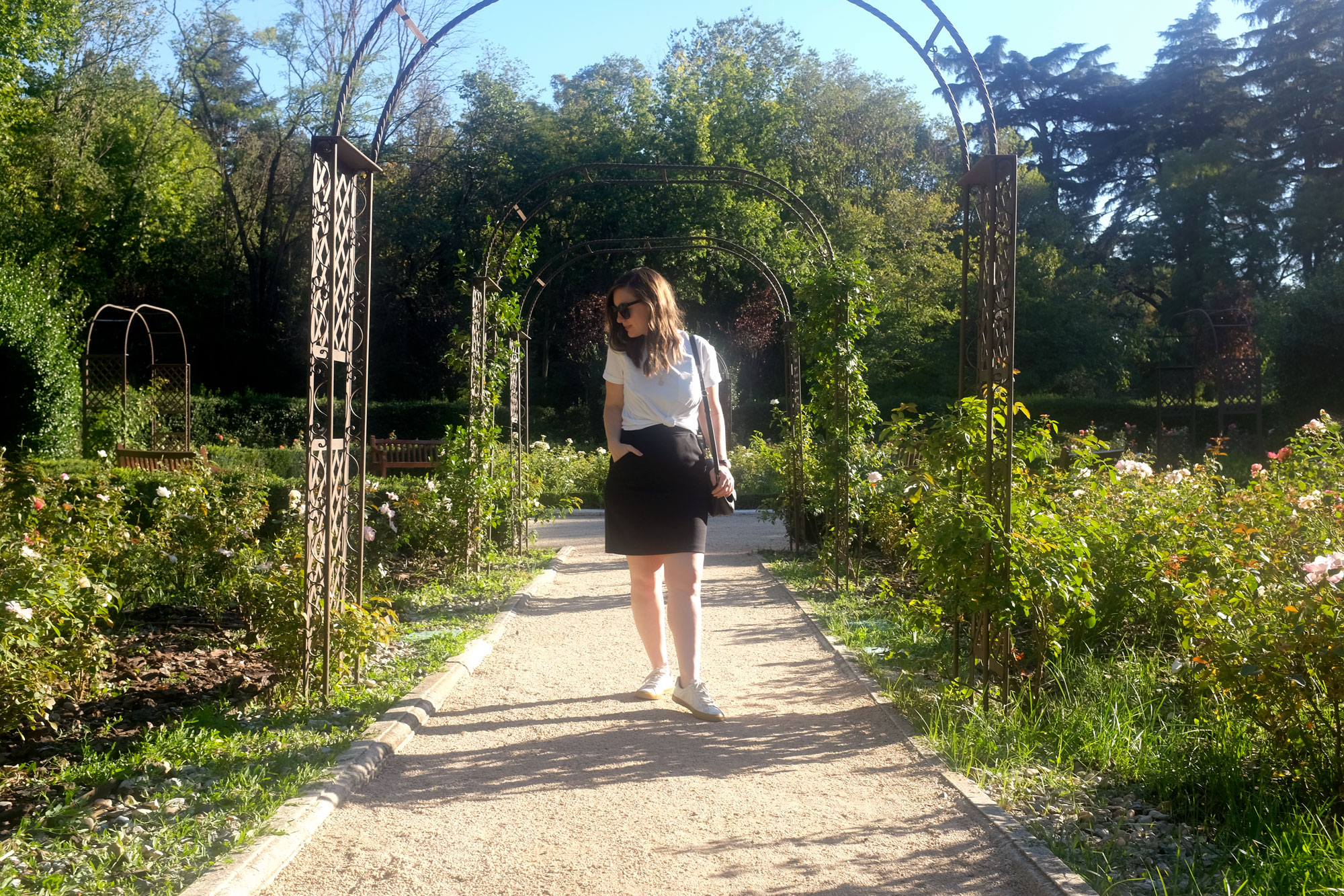 Alyssa in a rose garden in Madrid
