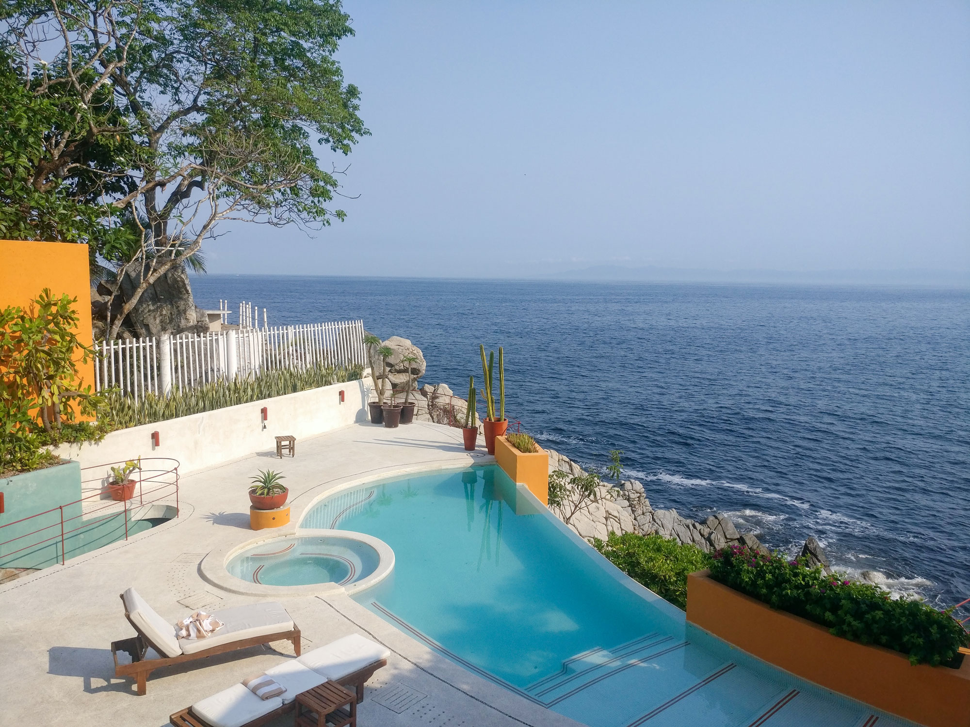 View over a resort pool and the ocean