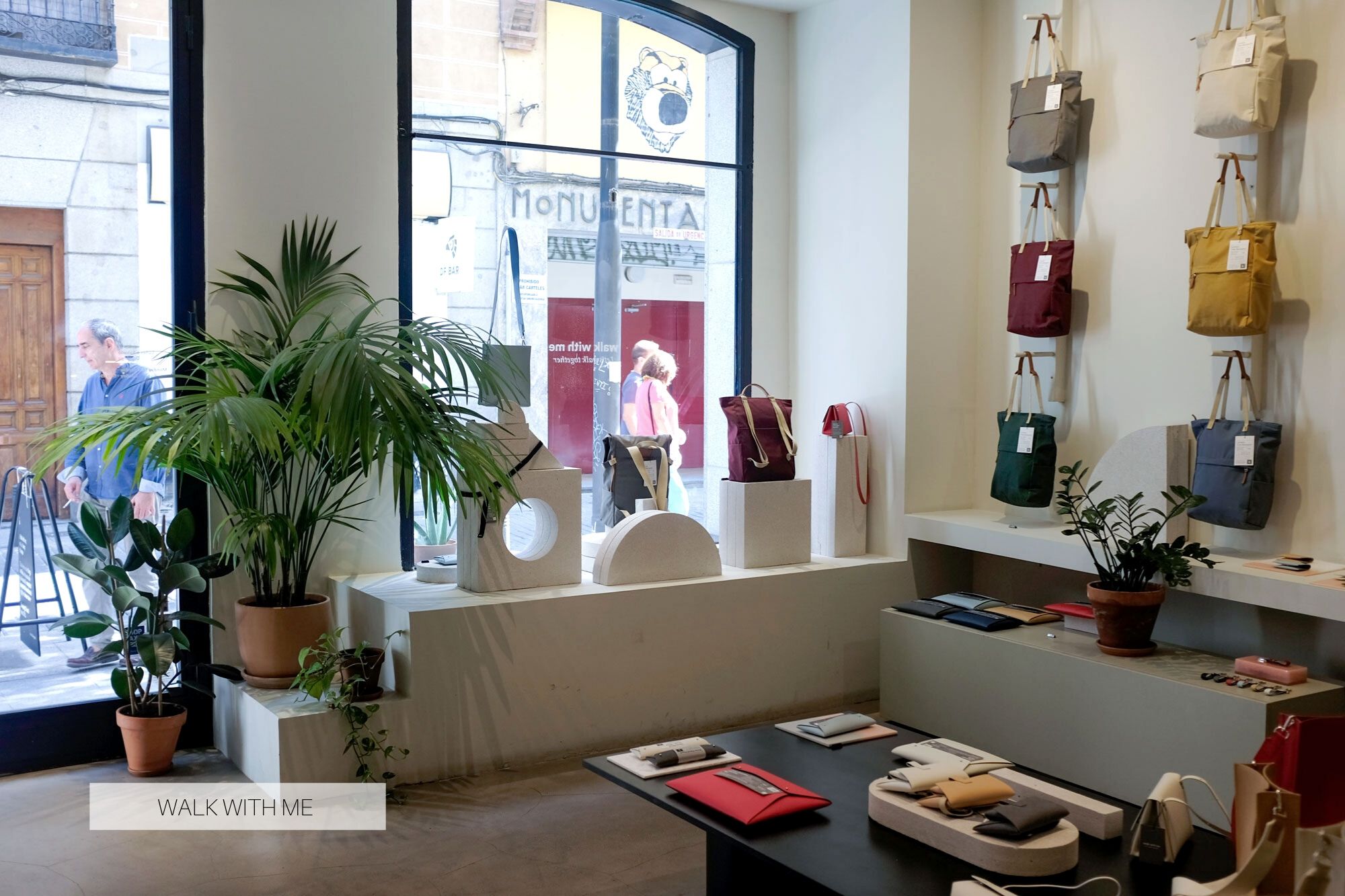 Interior of Walk with me in Madrid; there are lots of bags on display