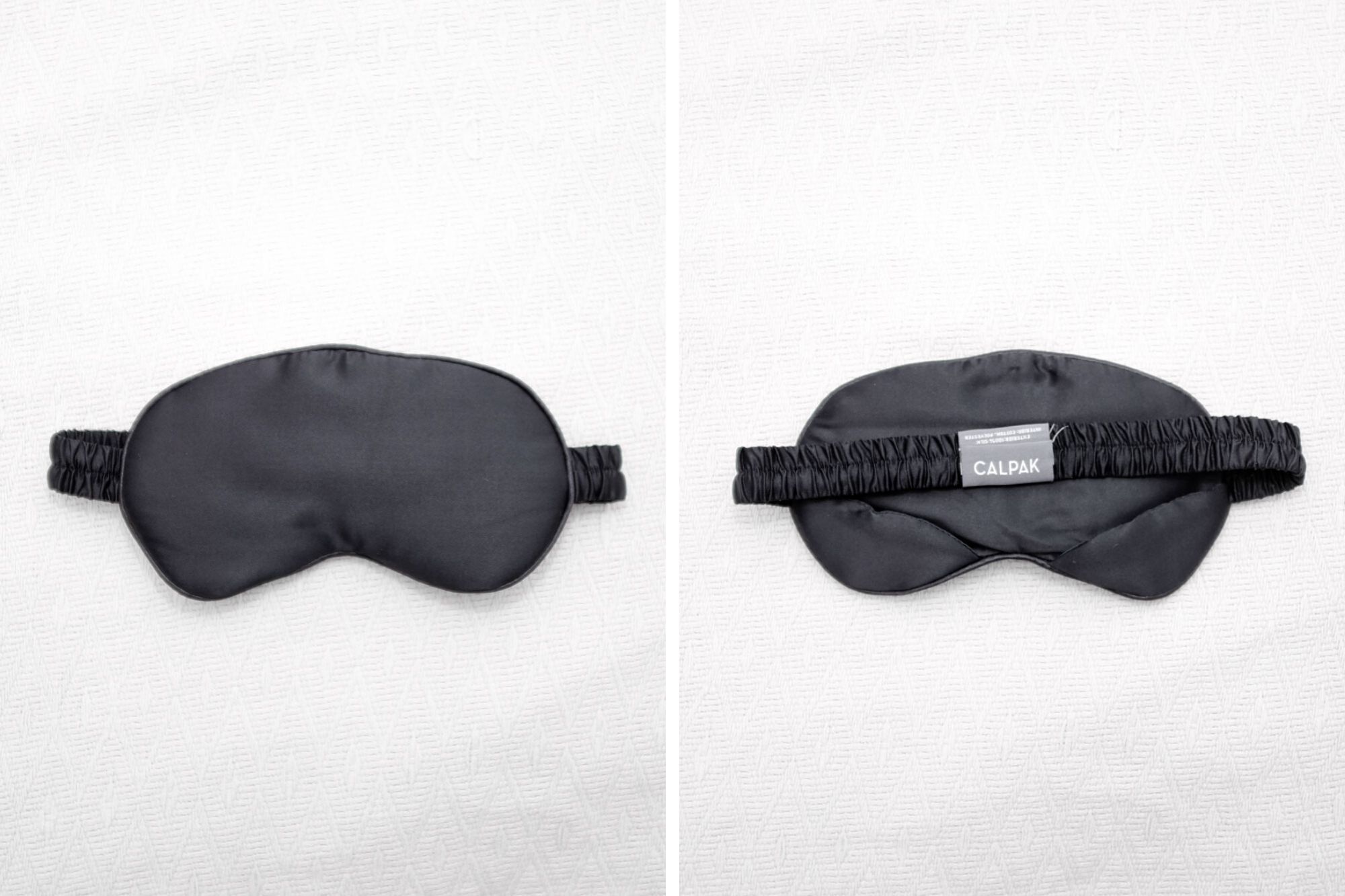 Collage of two images: one of the front of the black silk eye mask, and one of the back, which shows the strap and the CALPAK tag.