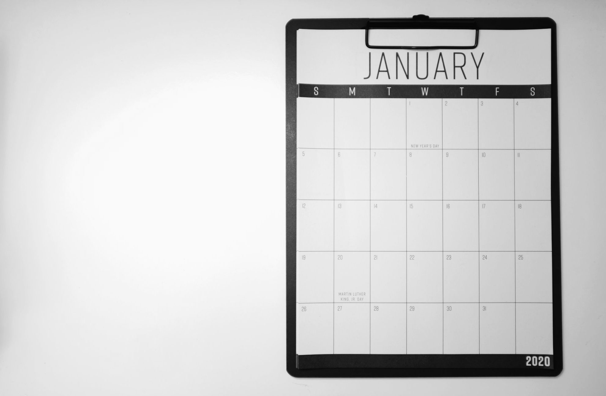 A calendar for January 2020 on a clipboard