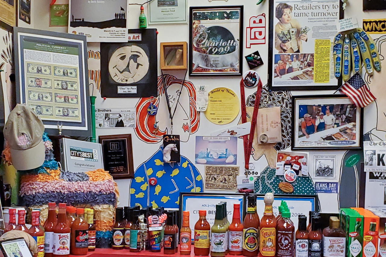 Photos and memorabilia on the walls at Johnny Burrito