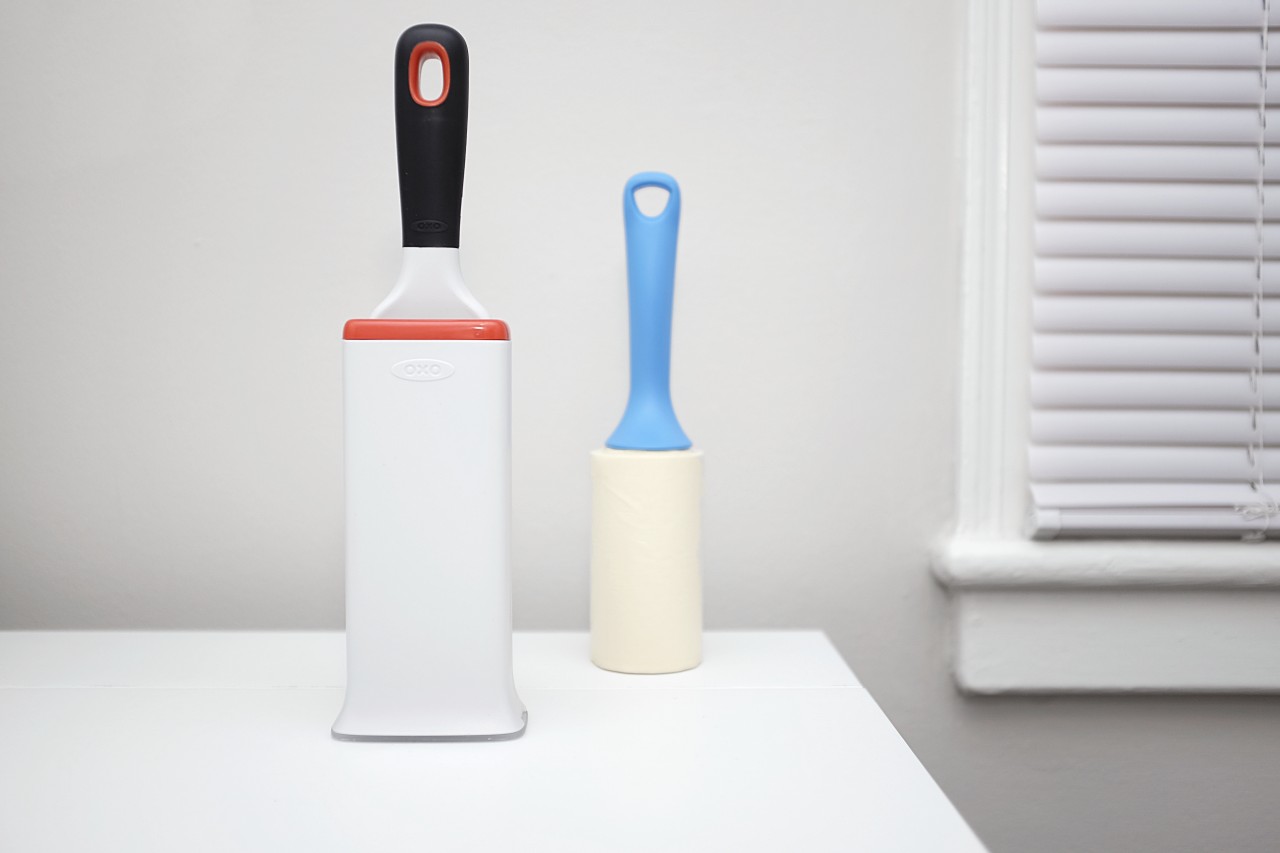 Two lint removers: one reusable one, and one with replaceable sticky sheets