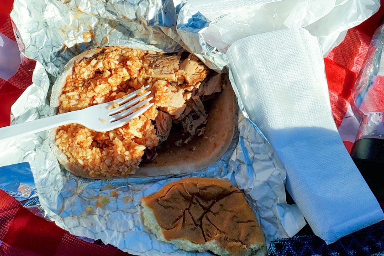 BBQ tray from Lexington Barbecue on a red picnic blanket