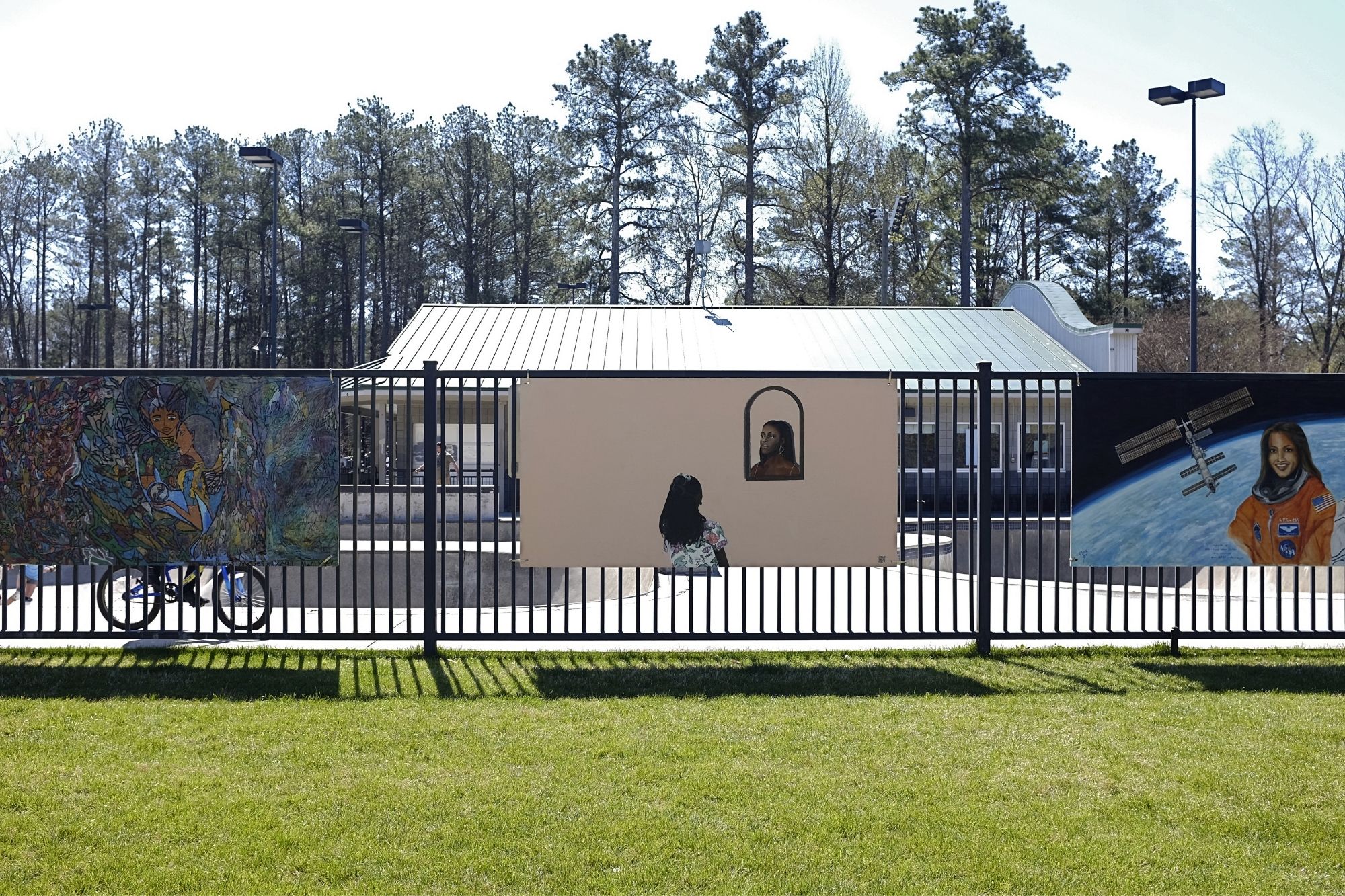 Three murals at Brook Run Park