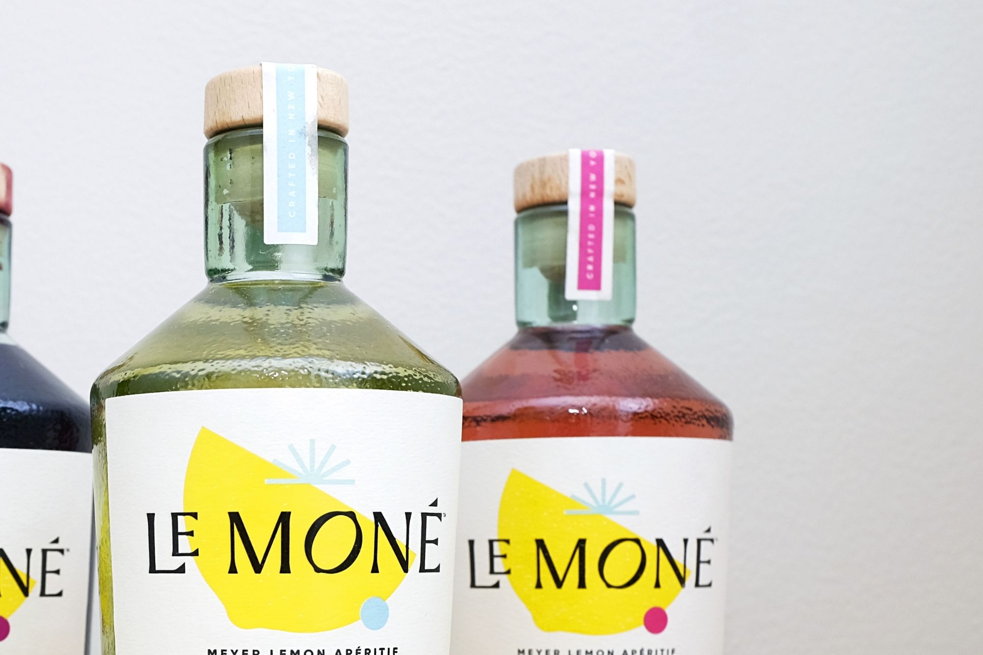 Close up of two Le Mone bottles